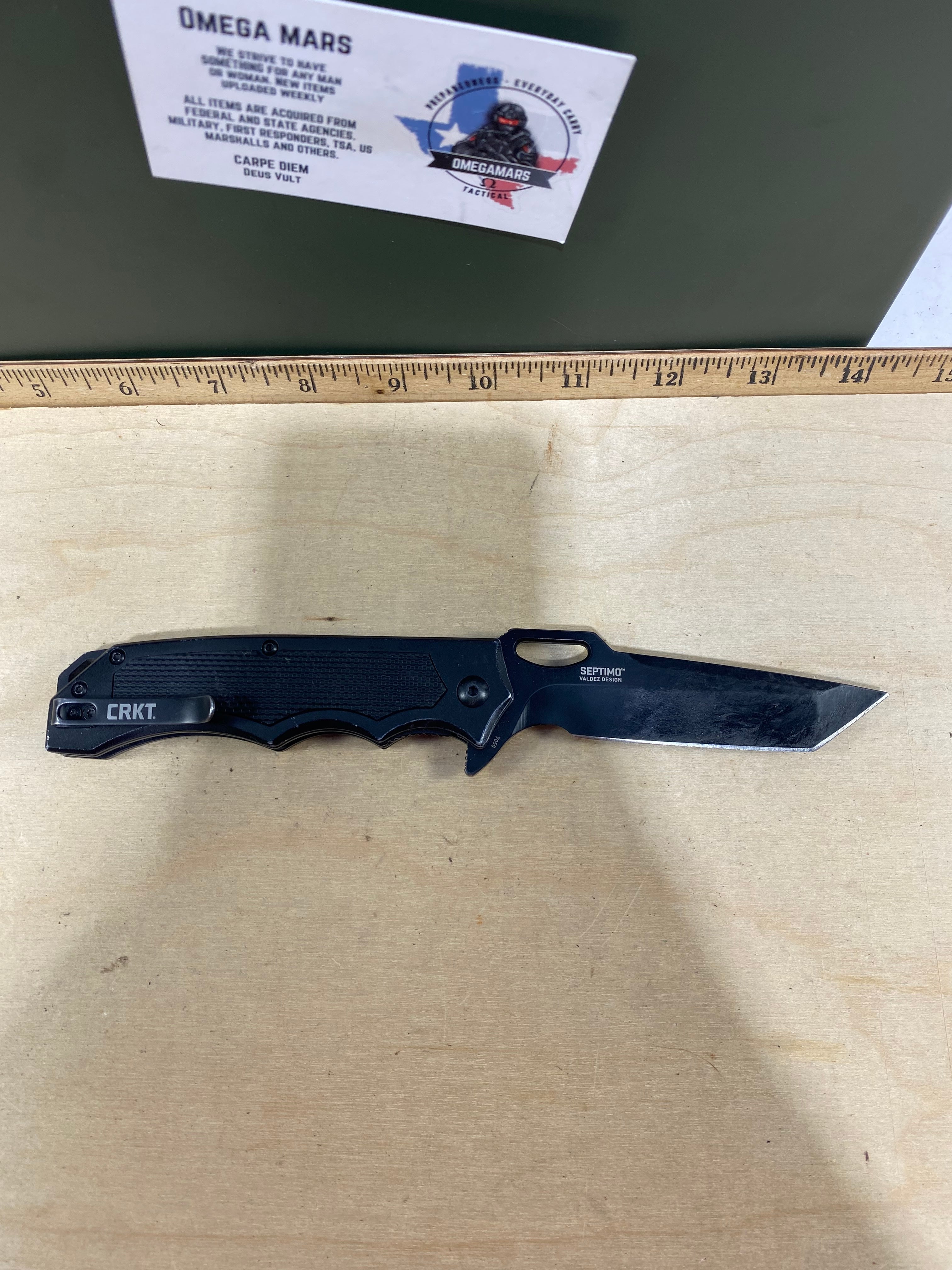 CRKT 7050 Septimo #-26. Light usage. Dirty. Pocket clip it's bent out. Chips on blade. Resharpened.