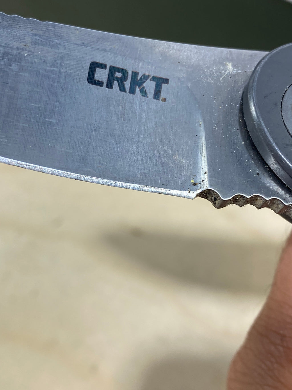 CRKT K300KXP #-39. Light usage. Dirty. Discontinued