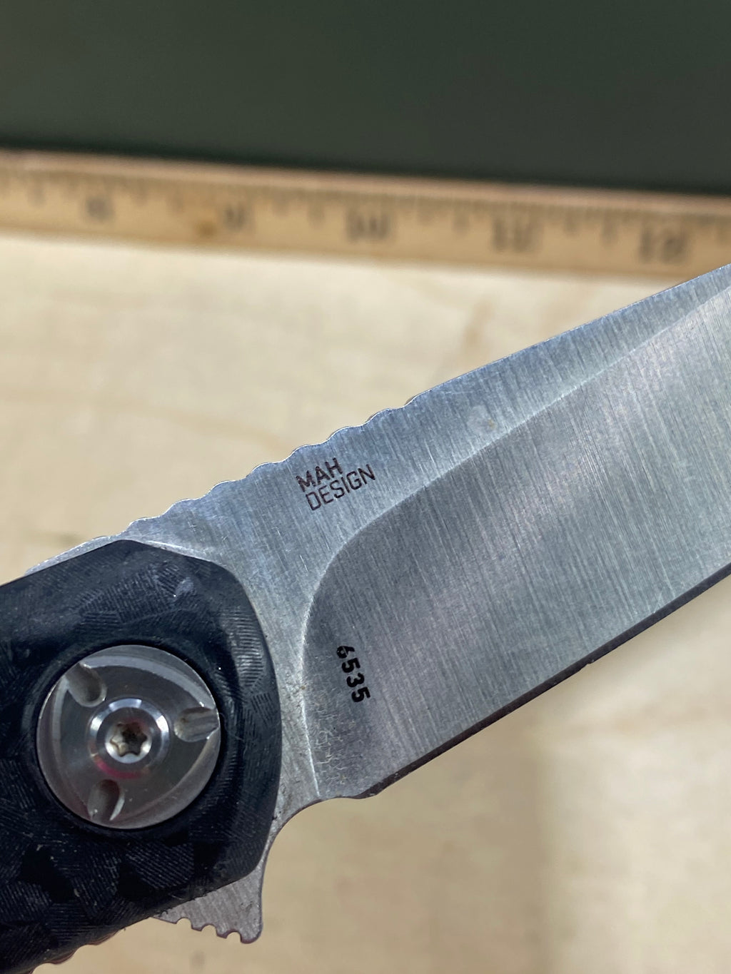 CRKT 6535 #-41. Light usage. Chip on blade.