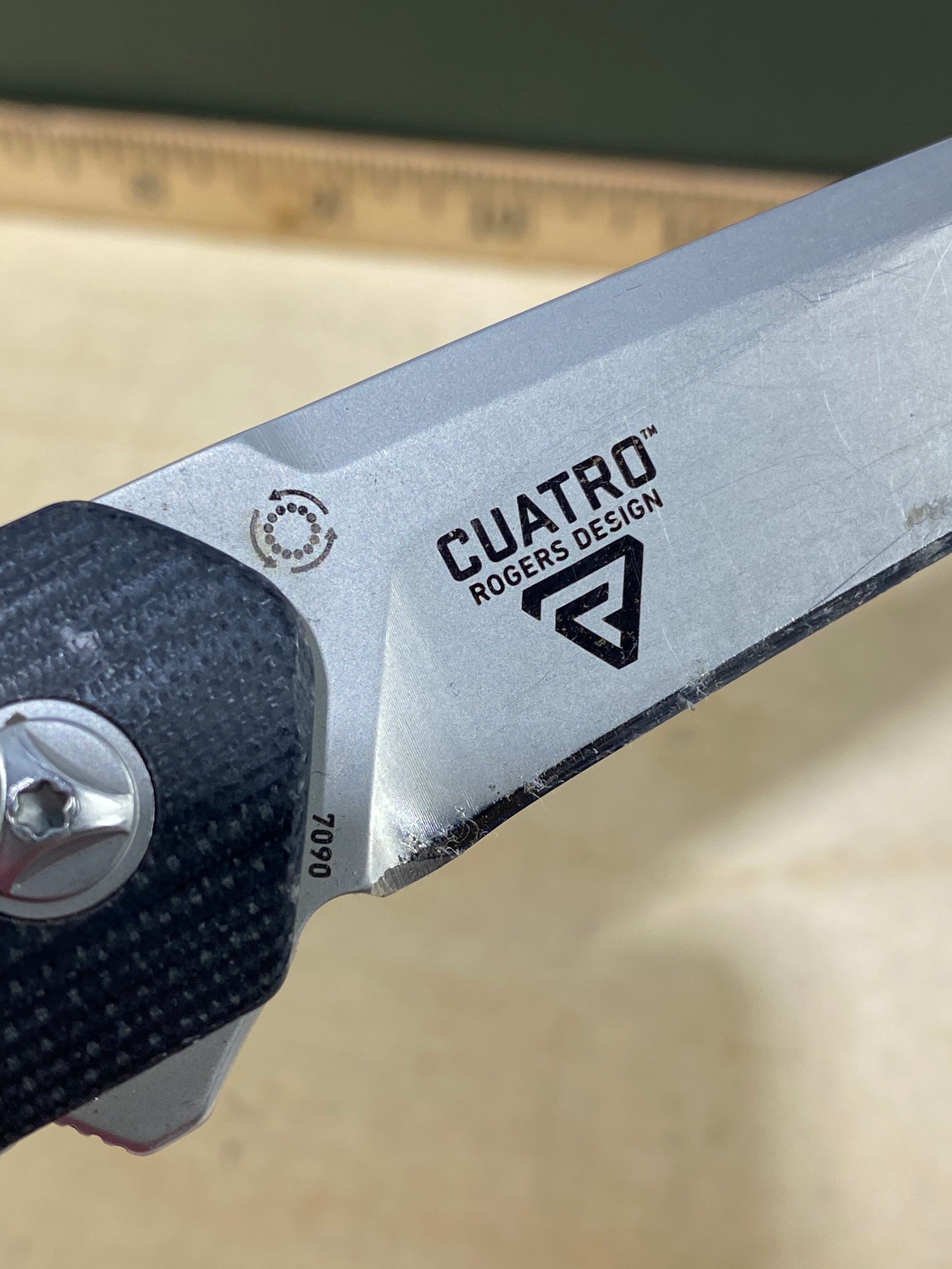 CRKT 7090 Cuatro #-42. Light usage. Resharpened. Discontinued.