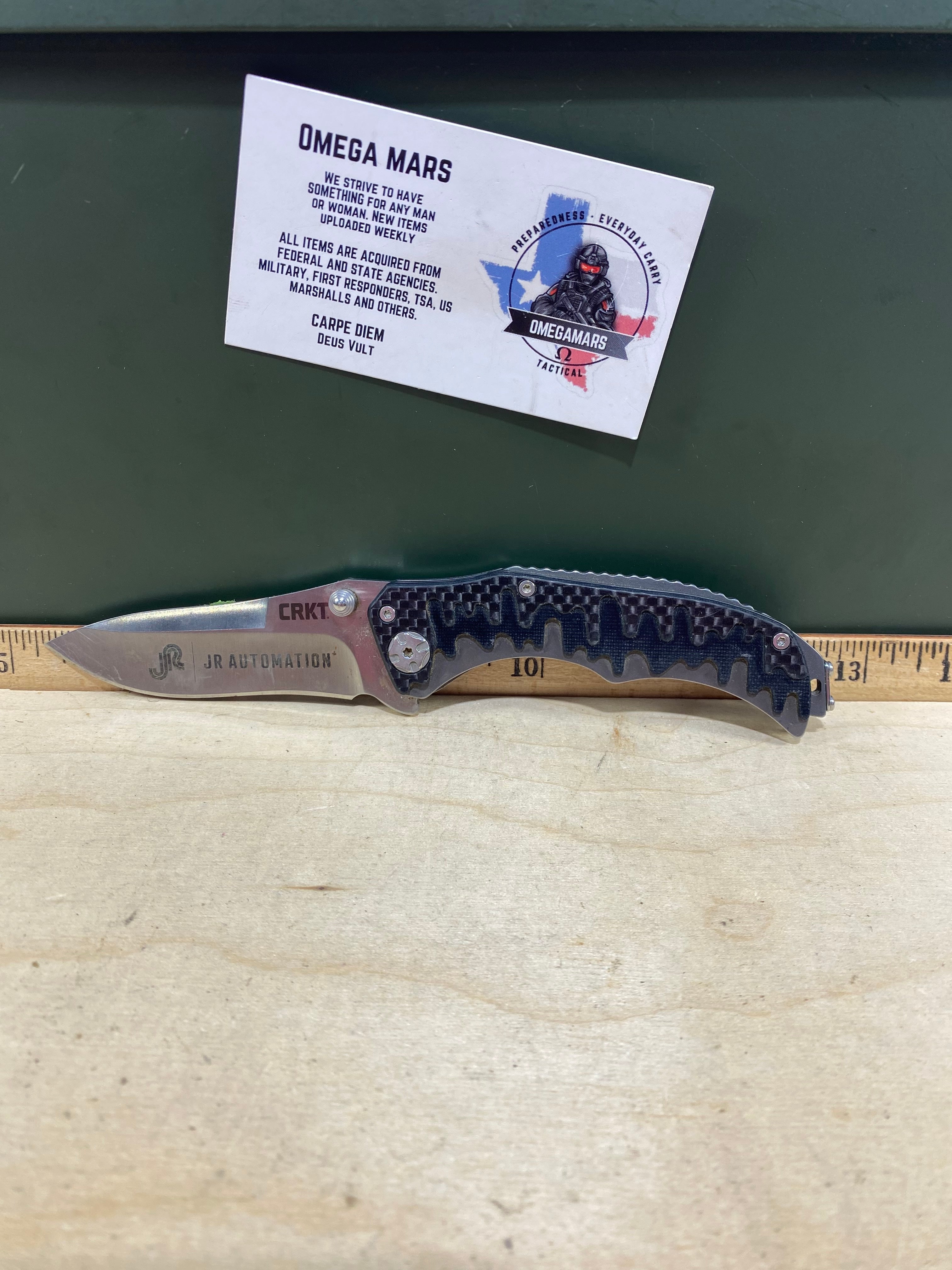 CRKT 1190 Drip Tighe #-46. Light usage. Dirty. Discontinued.