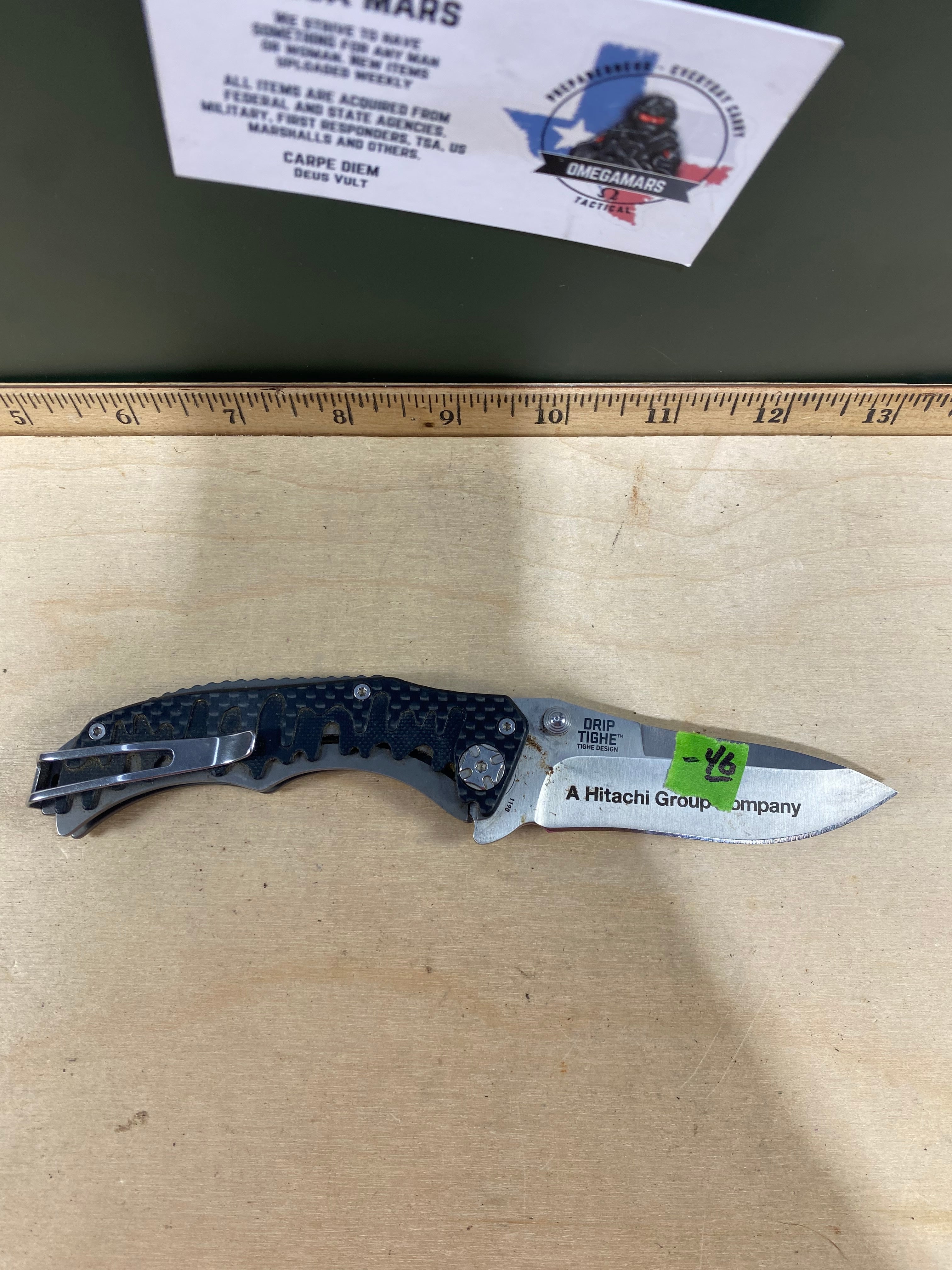 CRKT 1190 Drip Tighe #-46. Light usage. Dirty. Discontinued.
