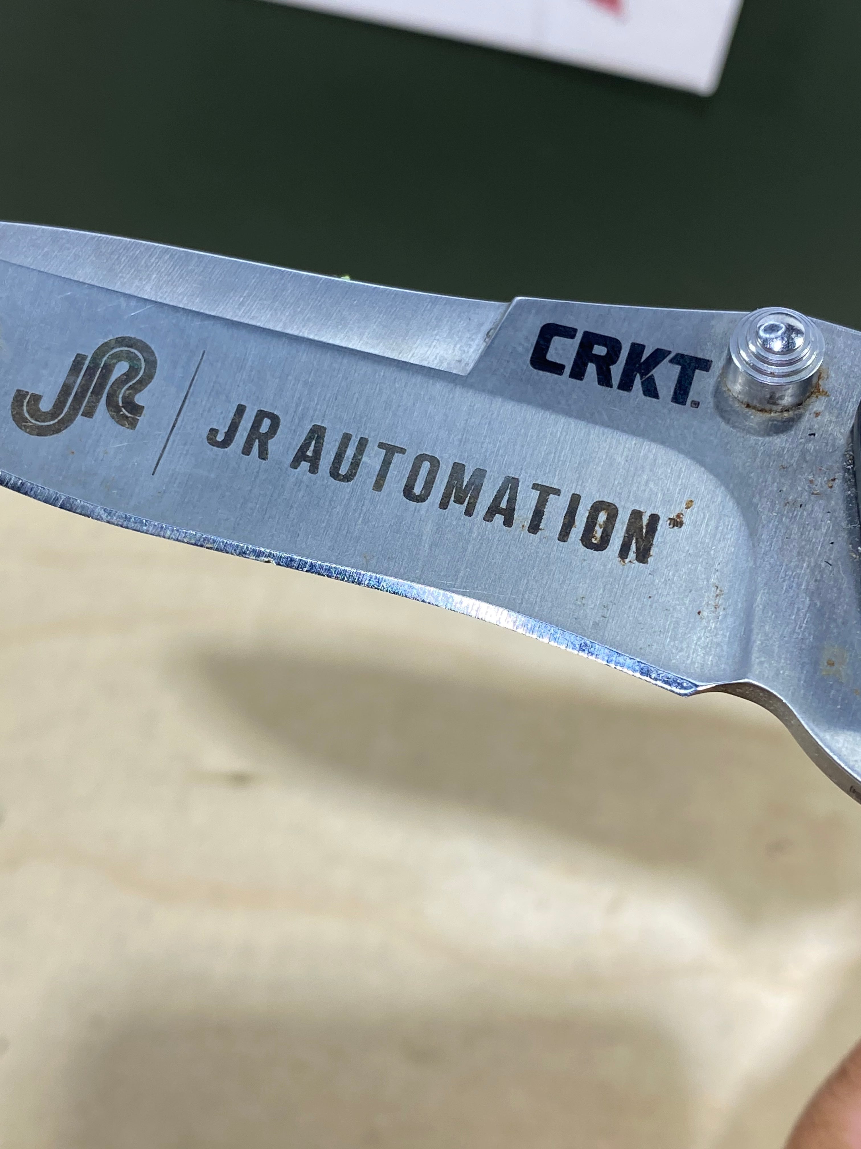 CRKT 1190 Drip Tighe #-46. Light usage. Dirty. Discontinued.