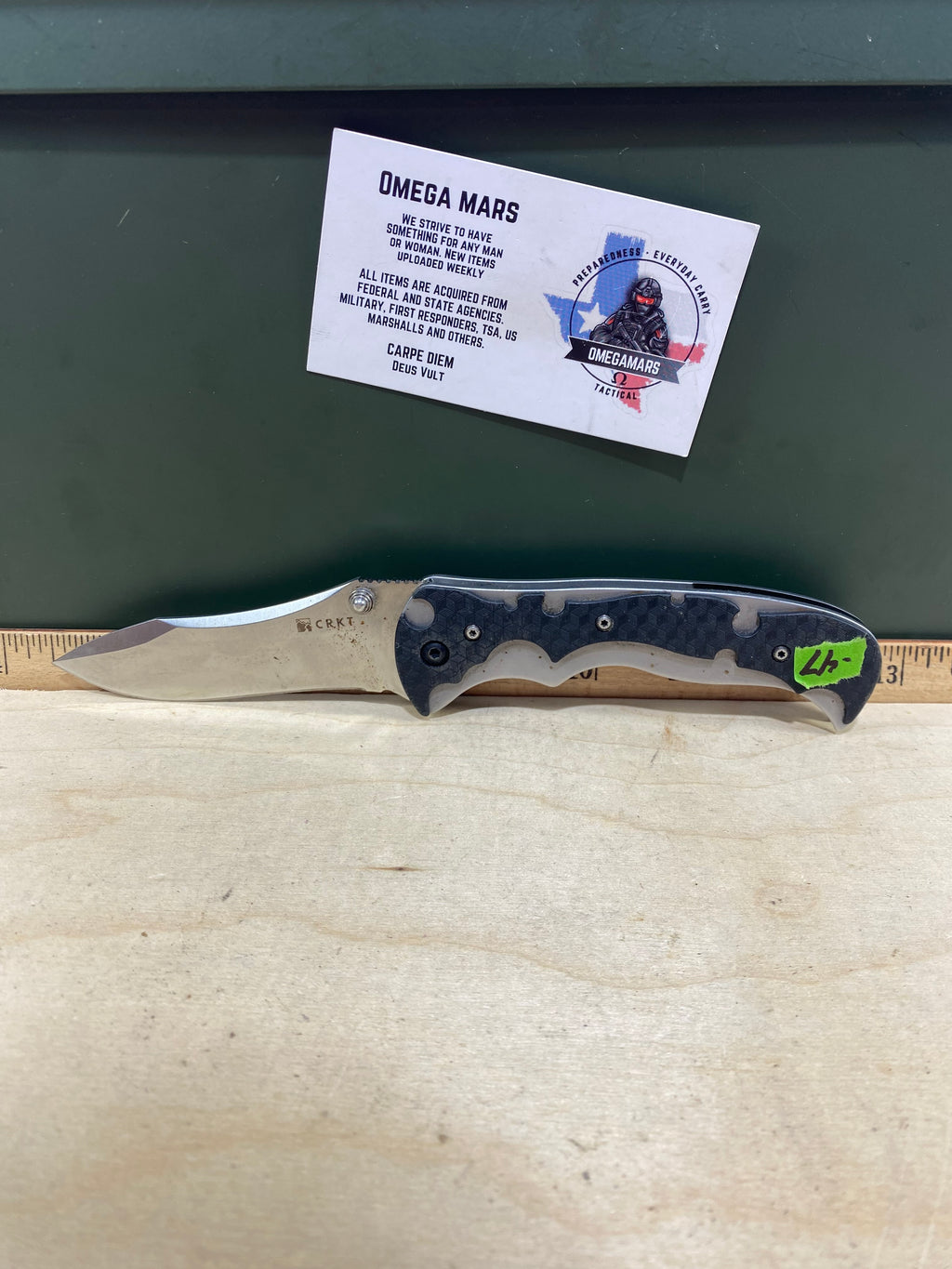 CRKT 1090 My Tighe #-47. Light usage. Chips on blade. Discontinued.