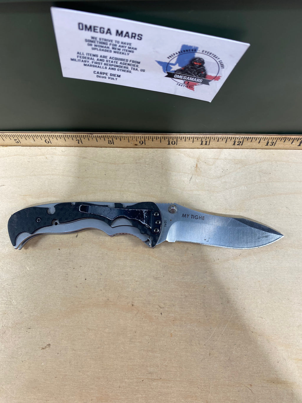 CRKT 1090 My Tighe #-47. Light usage. Chips on blade. Discontinued.