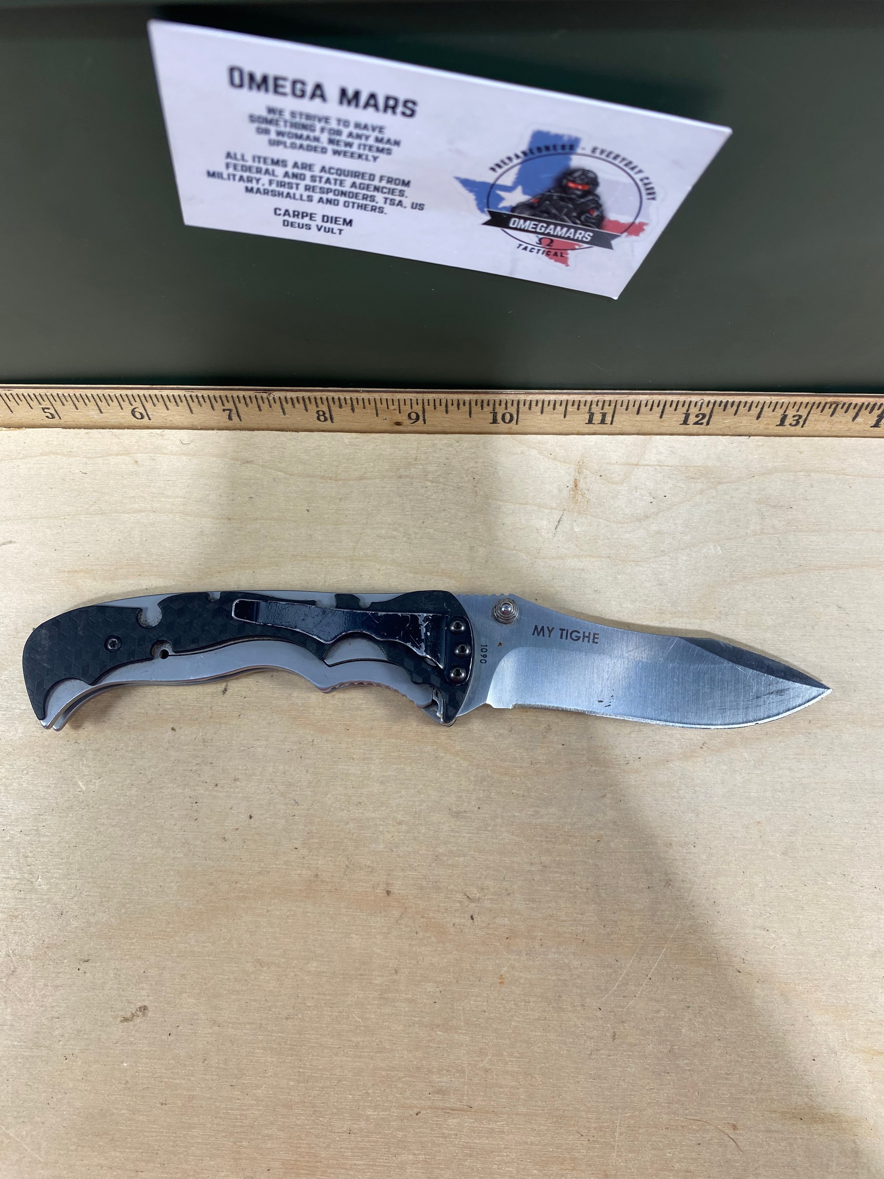 CRKT 1090 My Tighe #-47. Light usage. Chips on blade. Discontinued.