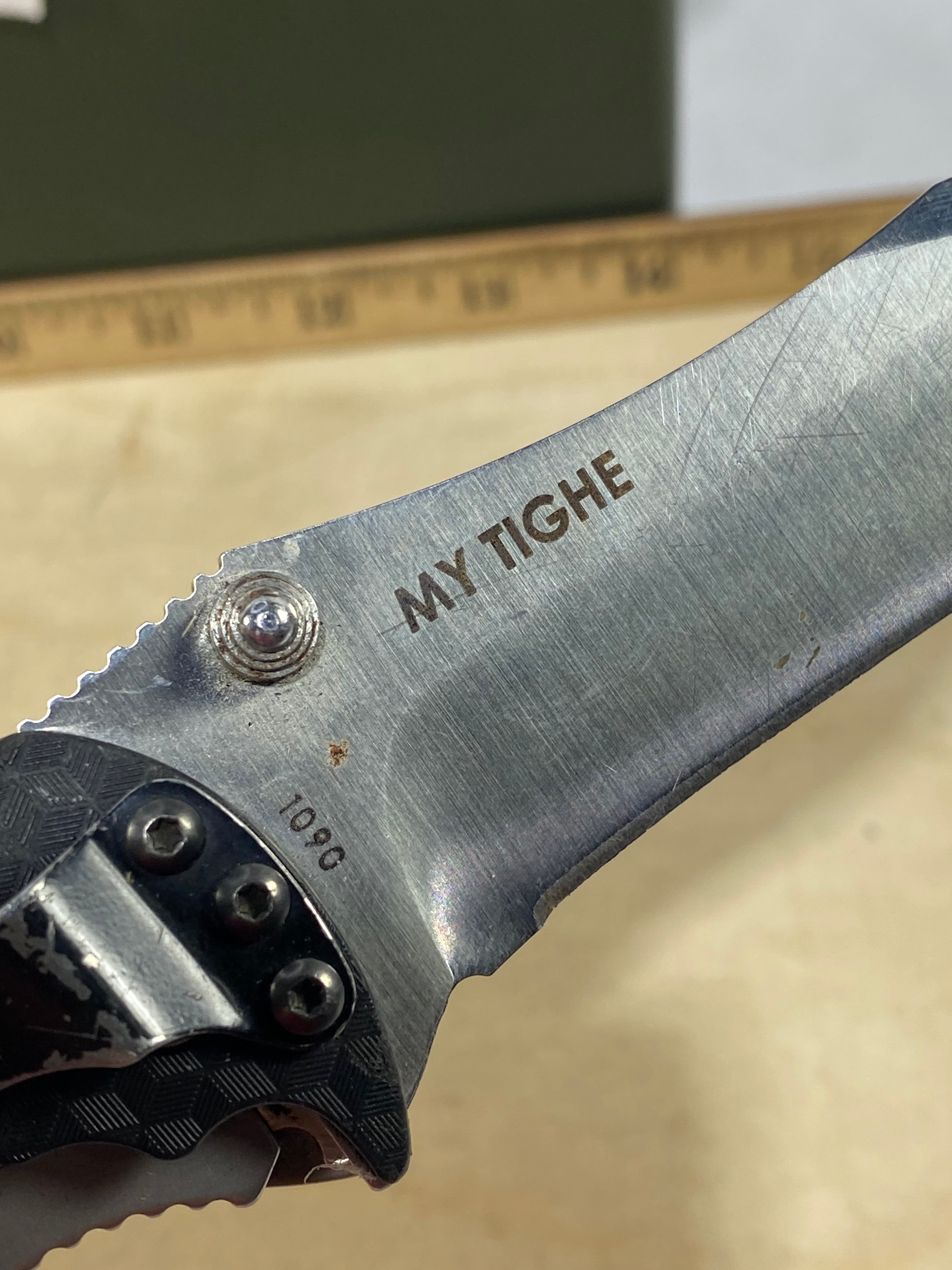 CRKT 1090 My Tighe #-47. Light usage. Chips on blade. Discontinued.
