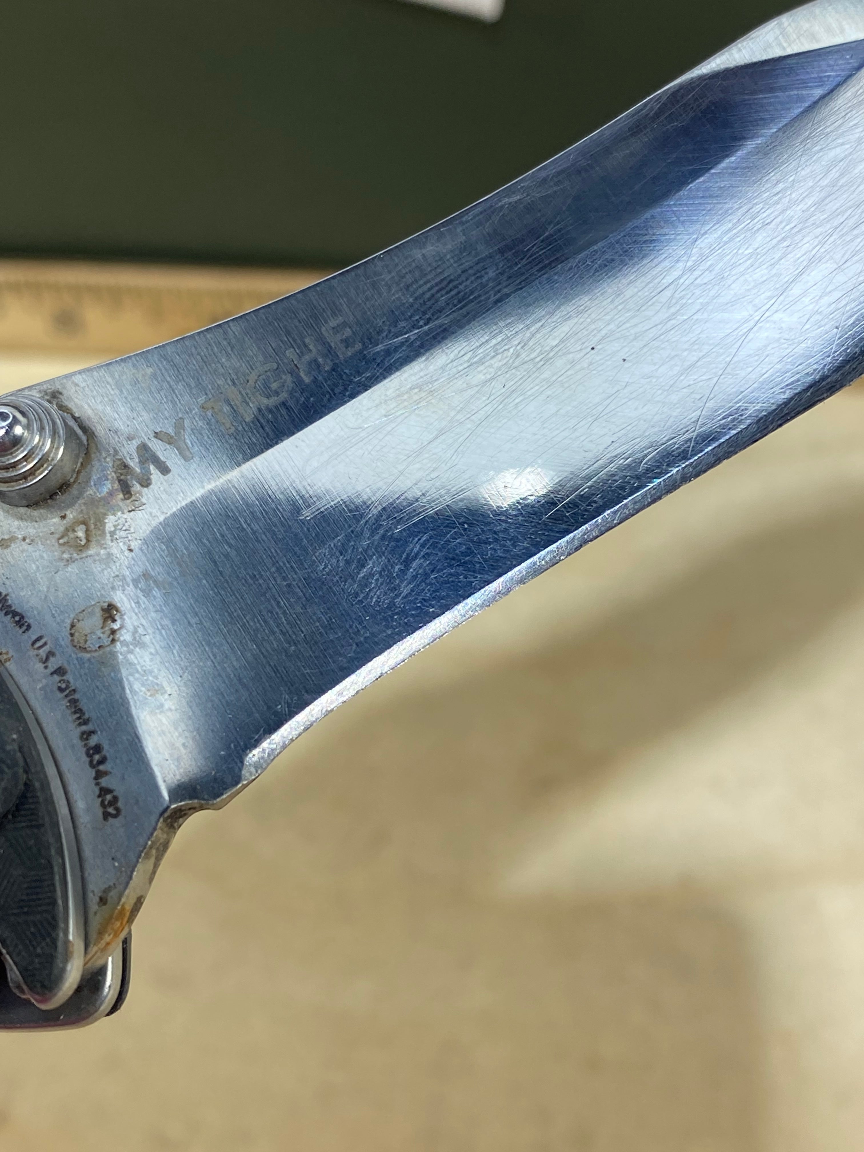 CRKT 1090 My Tighe #-48. Light usage. Missing pocket clip. Resharpened. Discontinued.