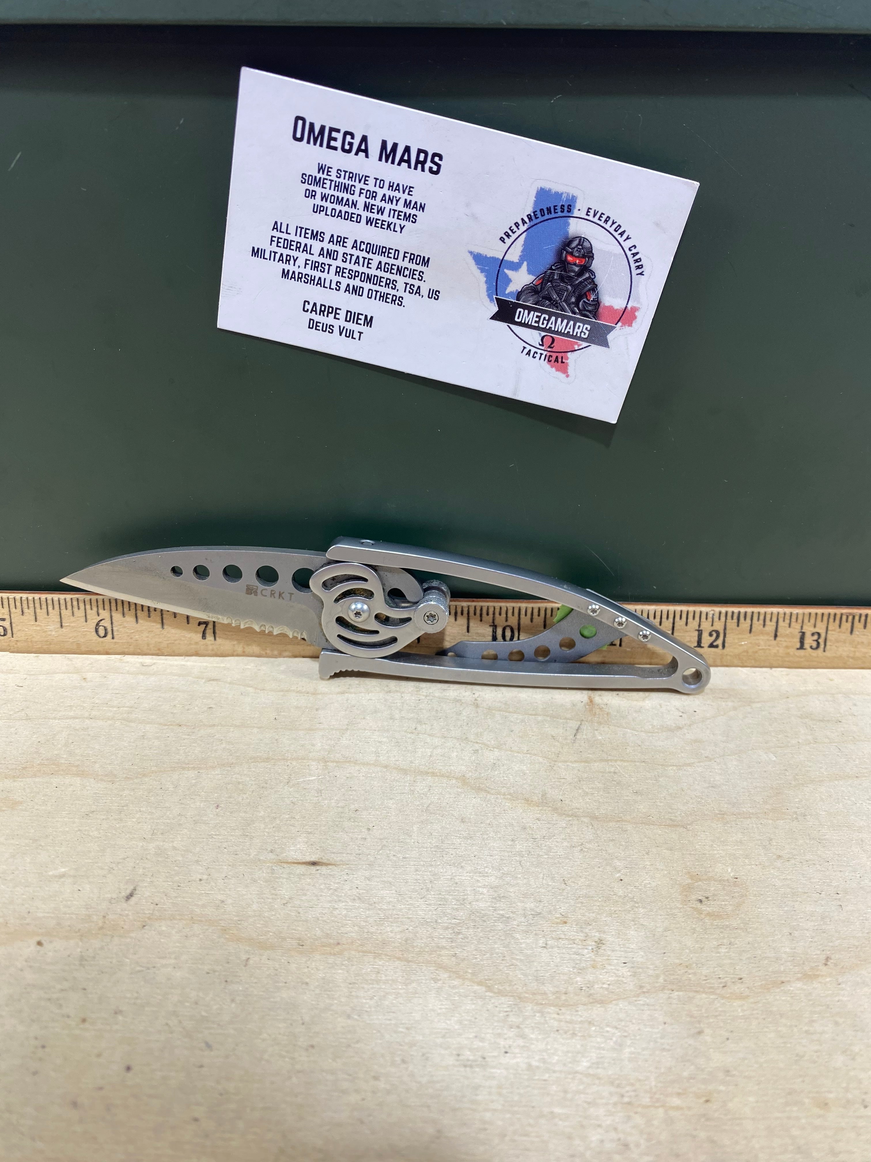 CRKT 5112 #-52. Light usage. Dirty. Discontinued.