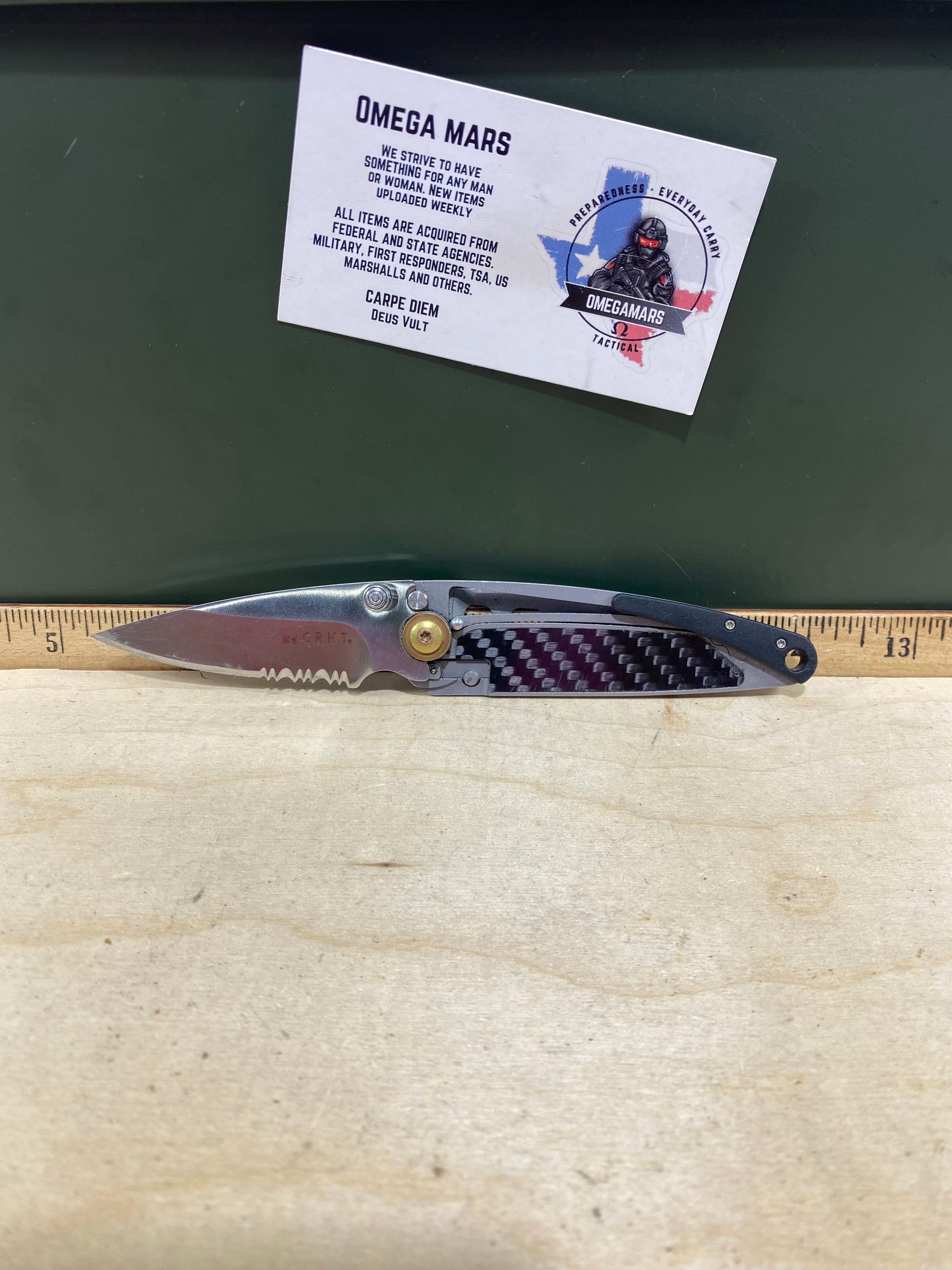 CRKT  5655 Kiss #-55. Light usage. Chips on blade. Dirty. Resharpened. Discontinued.