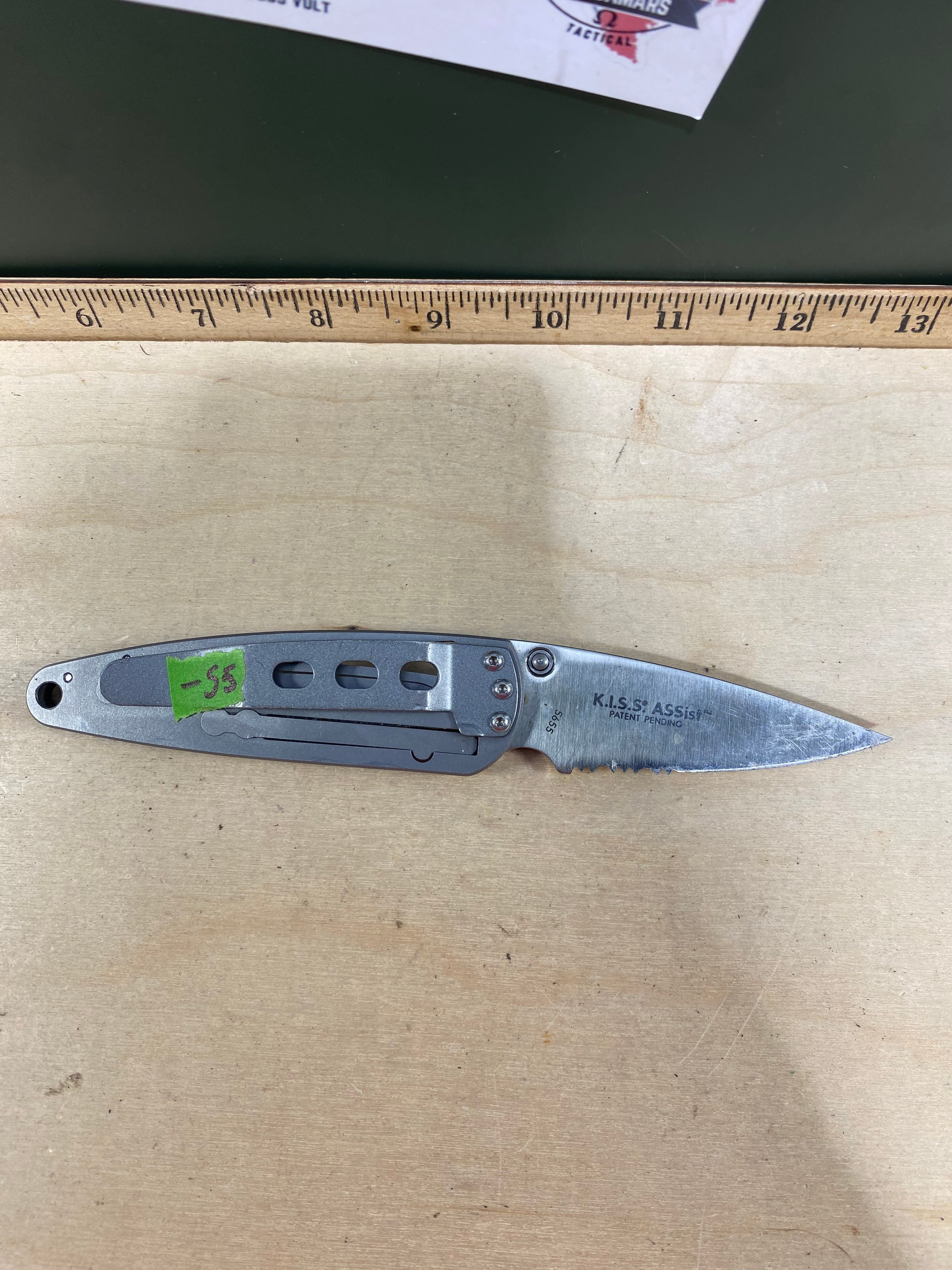 CRKT  5655 Kiss #-55. Light usage. Chips on blade. Dirty. Resharpened. Discontinued.