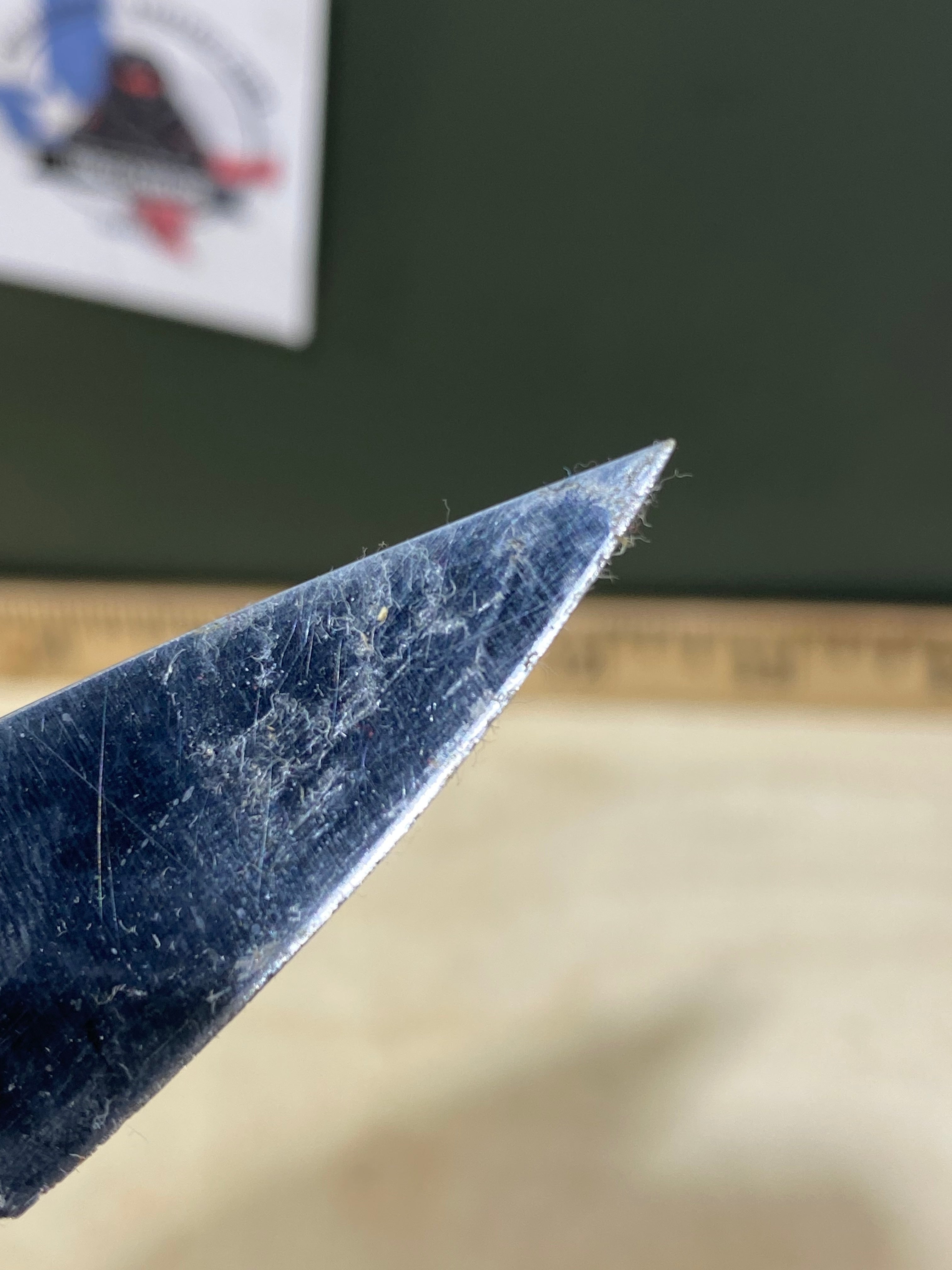 CRKT  5655 Kiss #-55. Light usage. Chips on blade. Dirty. Resharpened. Discontinued.