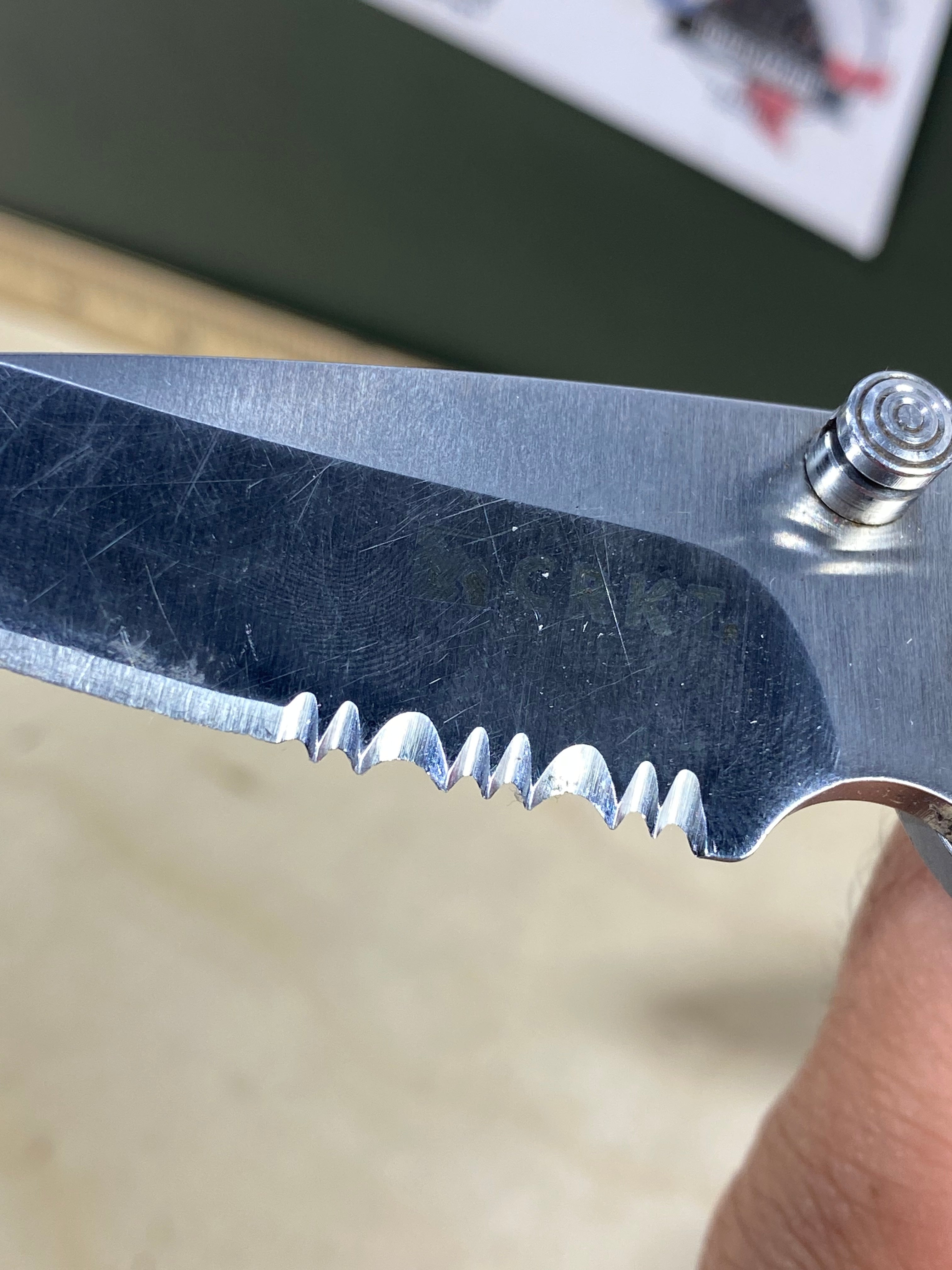 CRKT  5655 Kiss #-55. Light usage. Chips on blade. Dirty. Resharpened. Discontinued.