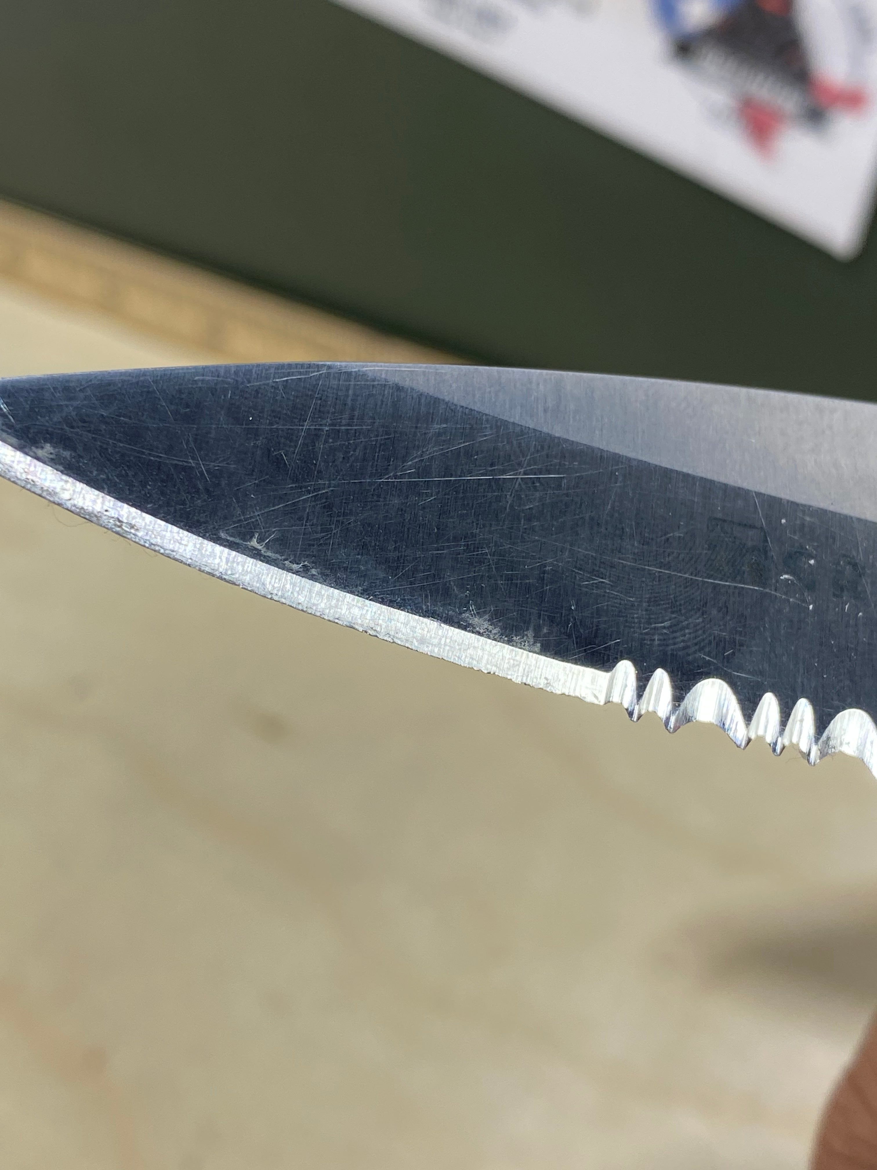 CRKT  5655 Kiss #-55. Light usage. Chips on blade. Dirty. Resharpened. Discontinued.