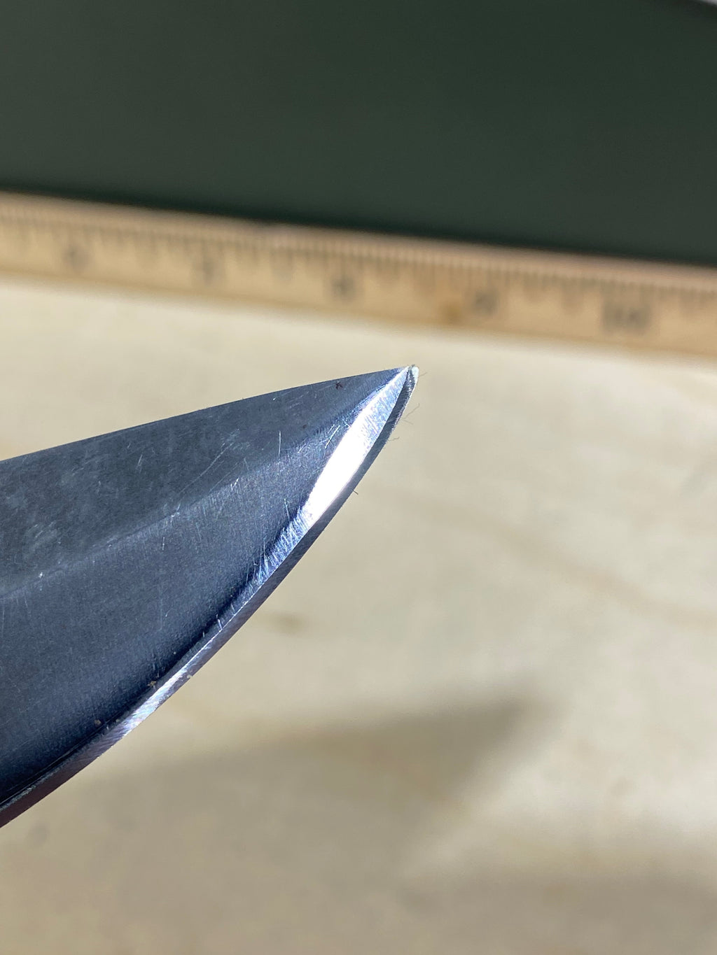 CRKT 6783N #-64. Light usage. Resharpened. Tip bent. Discontinued.