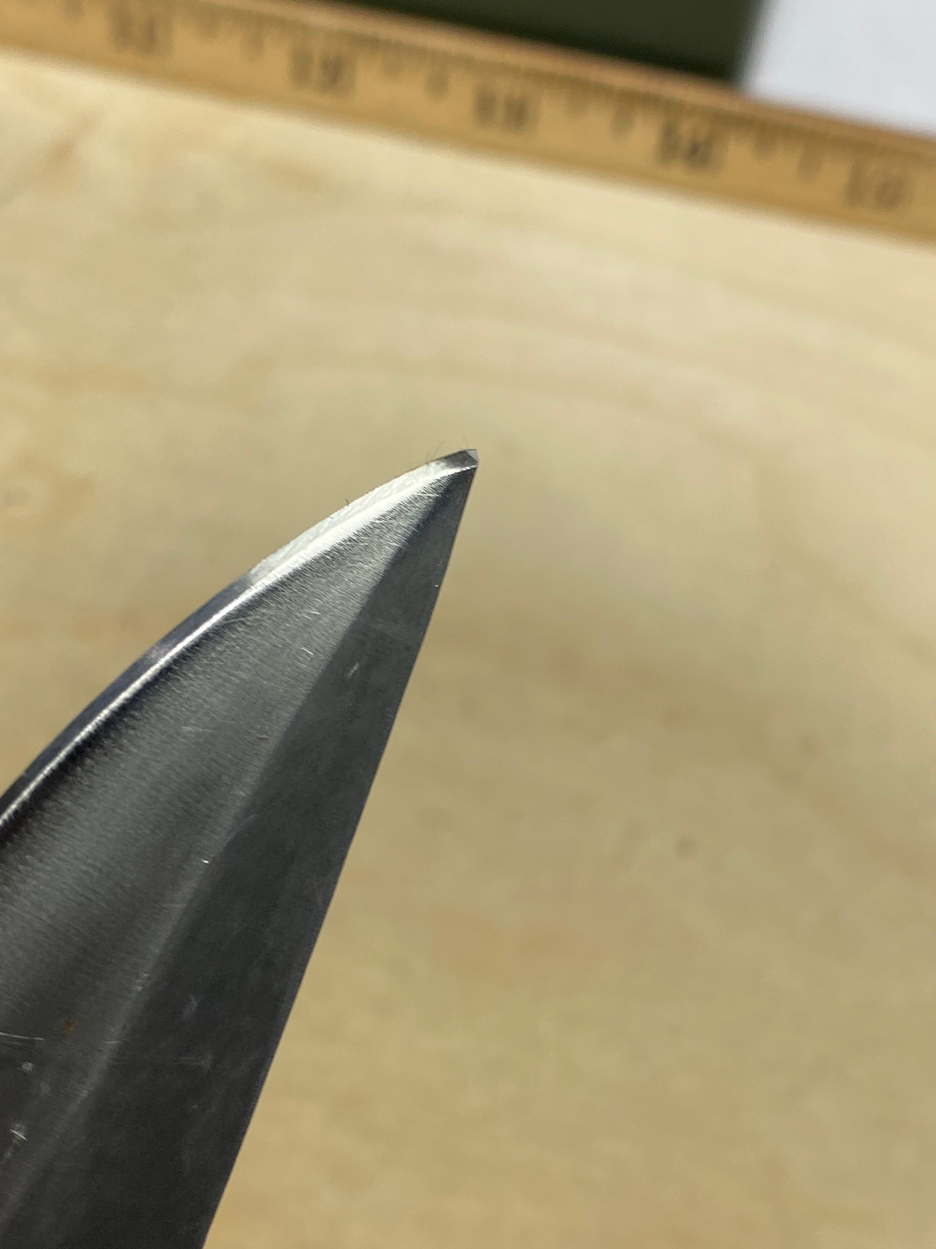 CRKT 6783N #-64. Light usage. Resharpened. Tip bent. Discontinued.