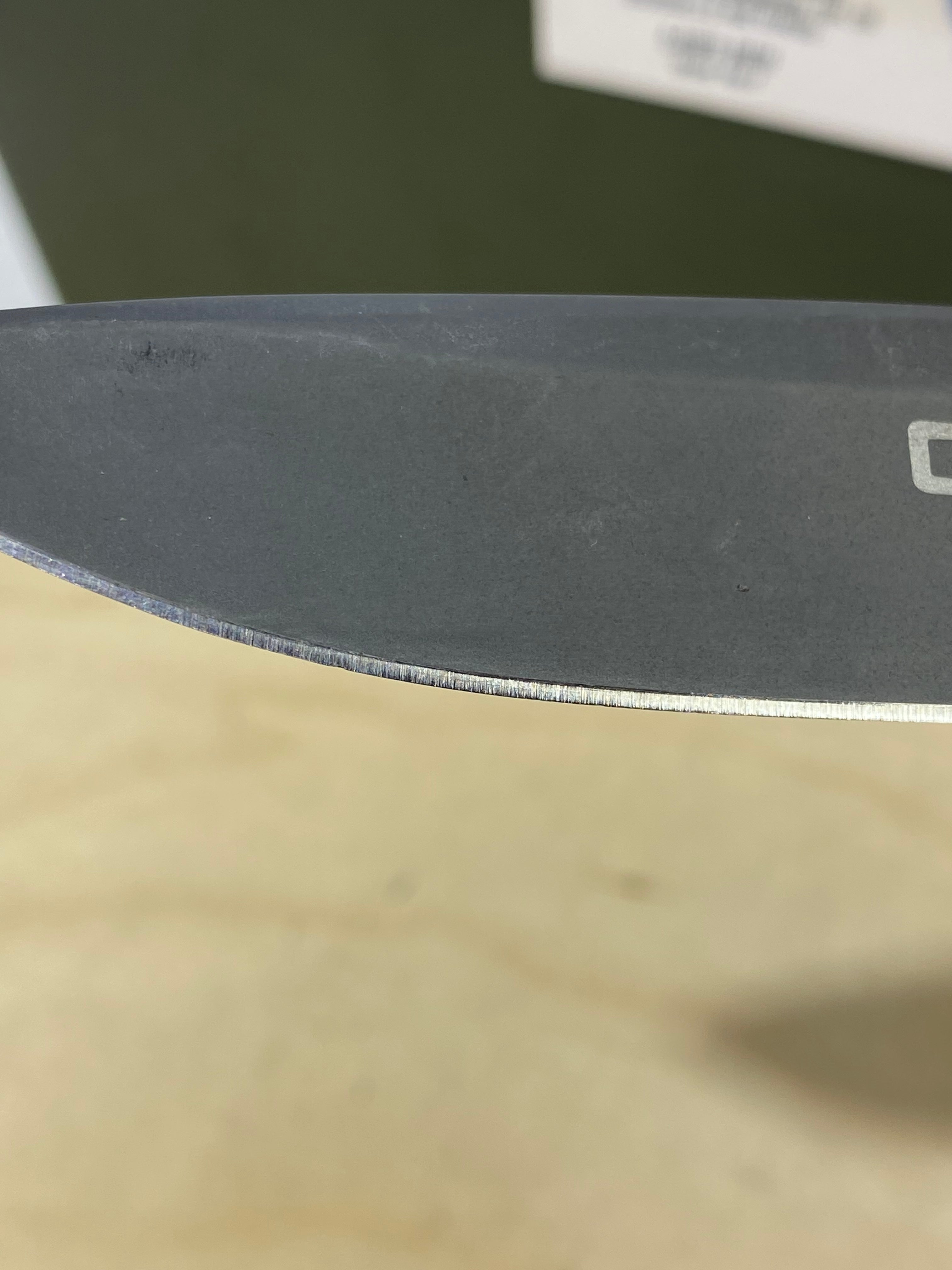 CRKT K330GGP Gusset #-74. Light usage. Chip on blade.