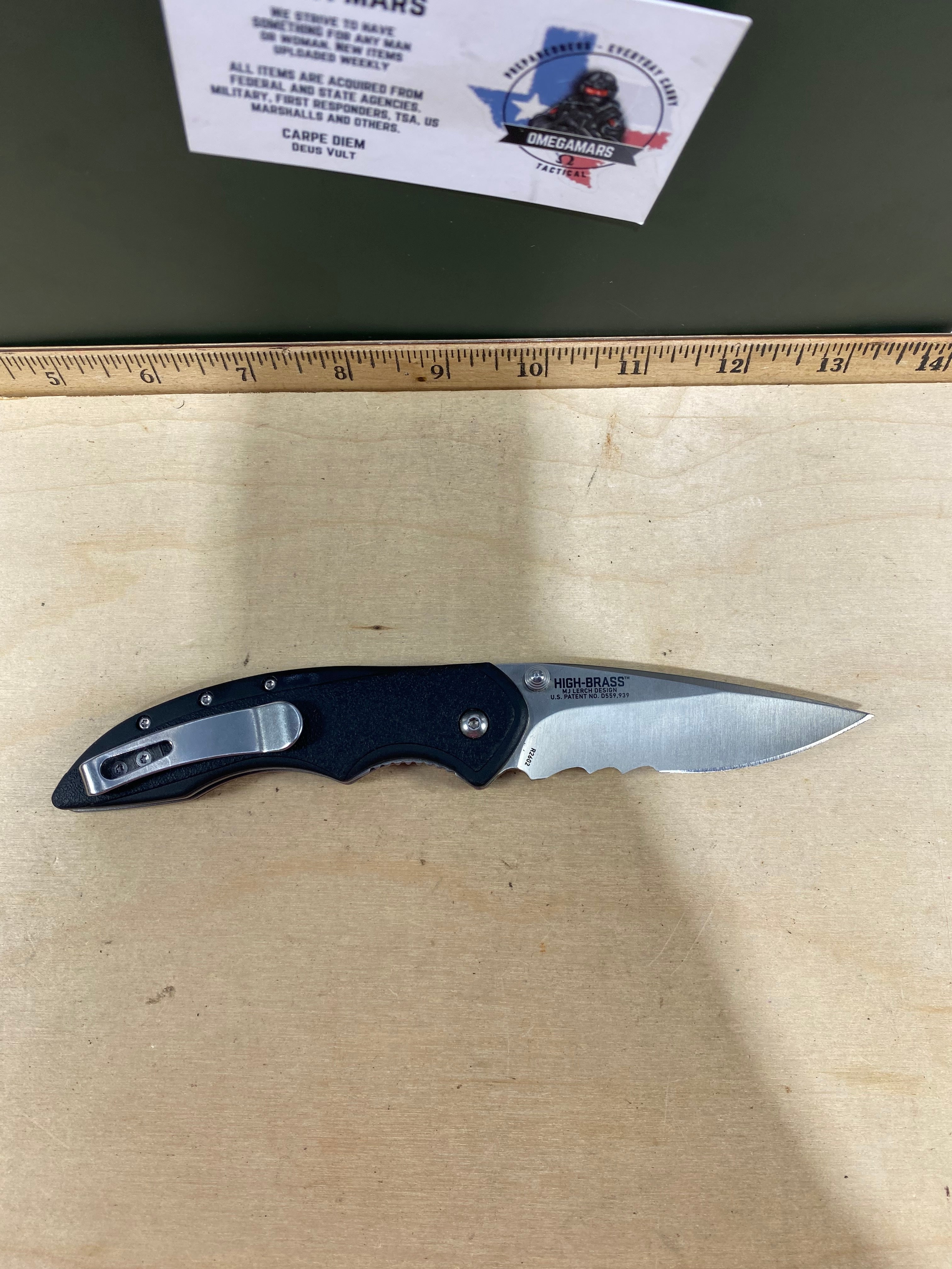 CRKT R2602 High-Brass #-90. Light usage.