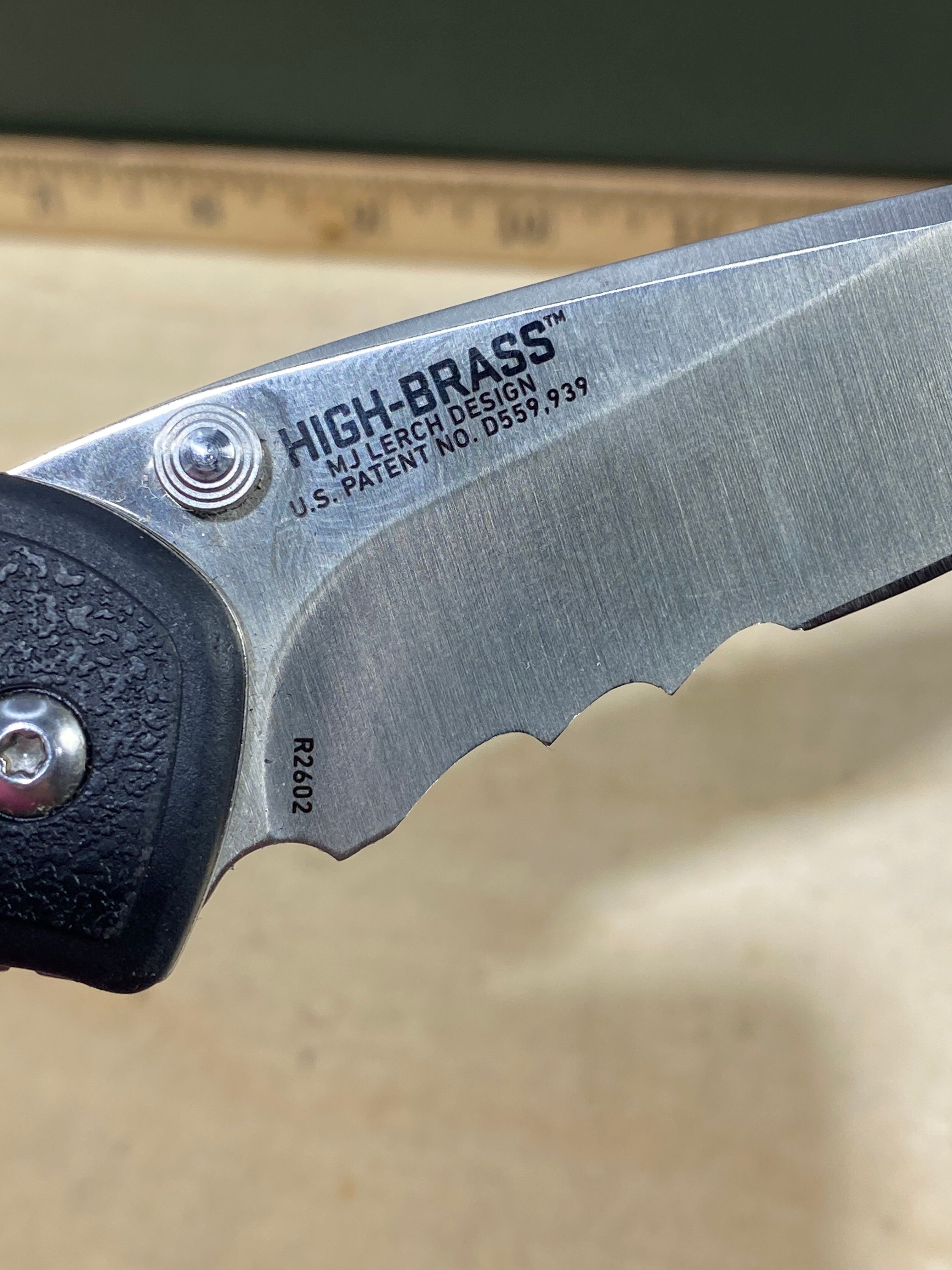 CRKT R2602 High-Brass #-90. Light usage.