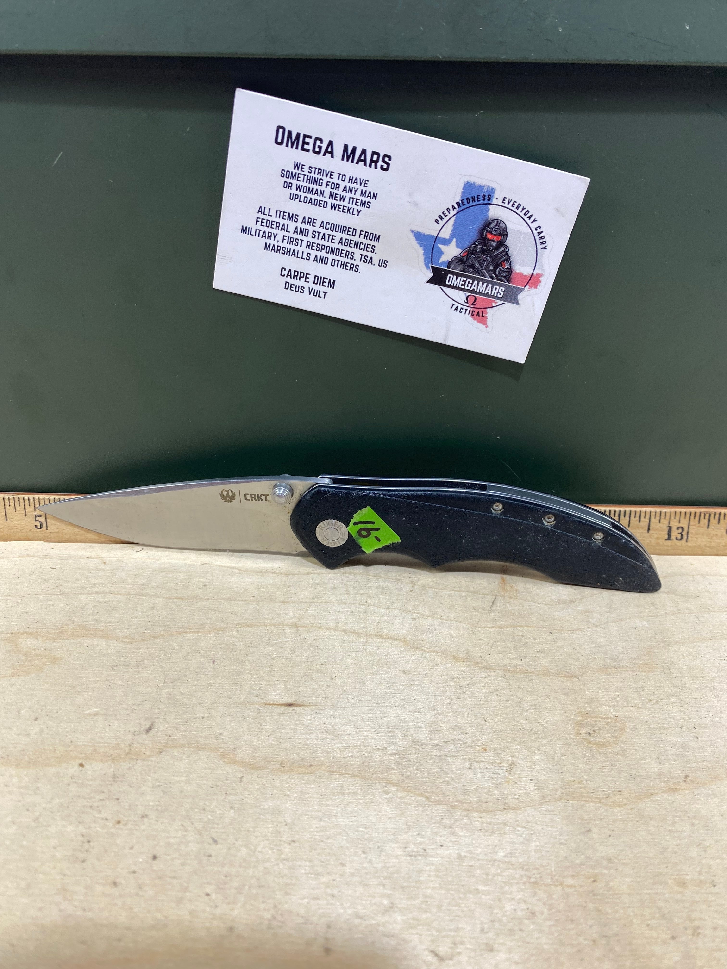 CRKT R2601 High-Brass #-91. Light usage. Chips on blade. Discontinued.