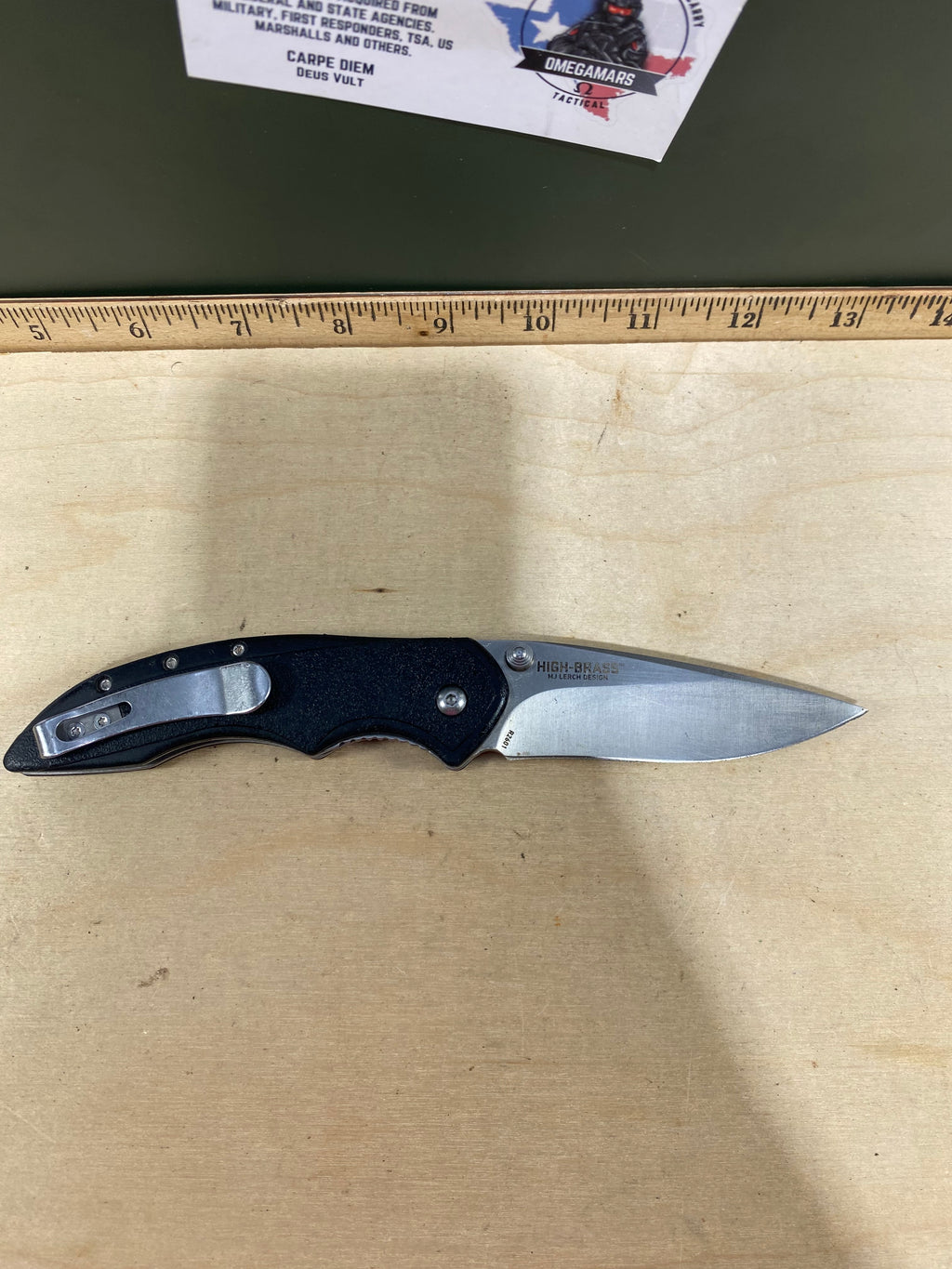CRKT R2601 High-Brass #-91. Light usage. Chips on blade. Discontinued.