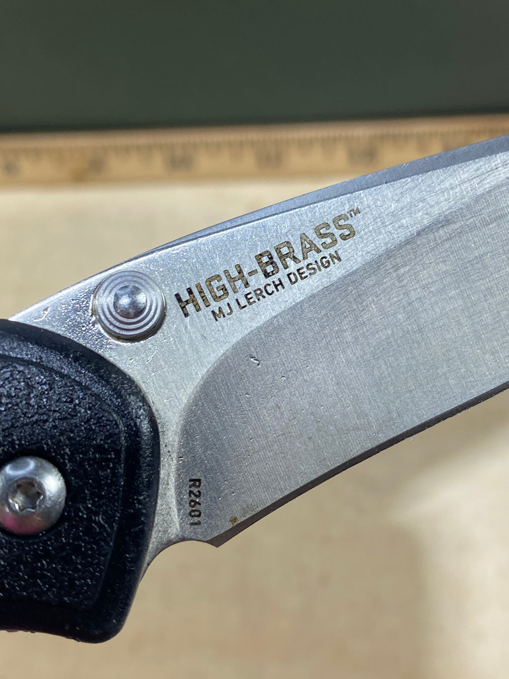 CRKT R2601 High-Brass #-91. Light usage. Chips on blade. Discontinued.