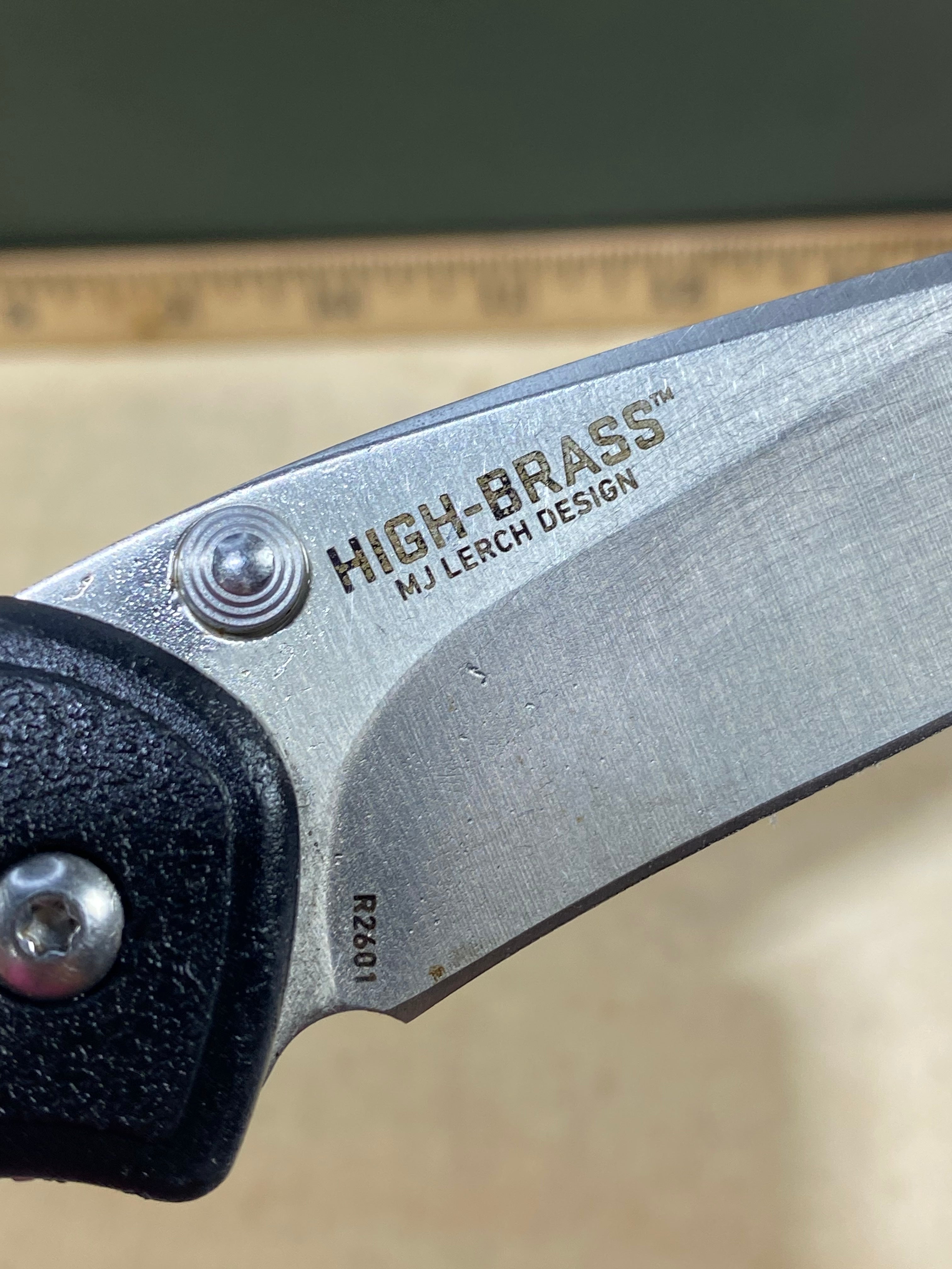 CRKT R2601 High-Brass #-91. Light usage. Chips on blade. Discontinued.