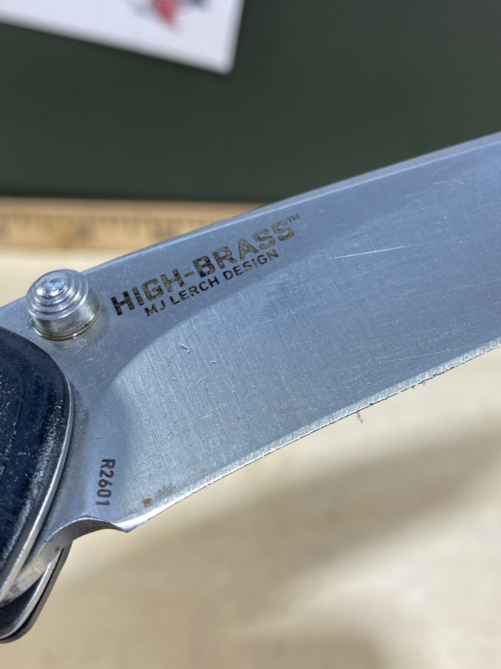 CRKT R2601 High-Brass #-91. Light usage. Chips on blade. Discontinued.