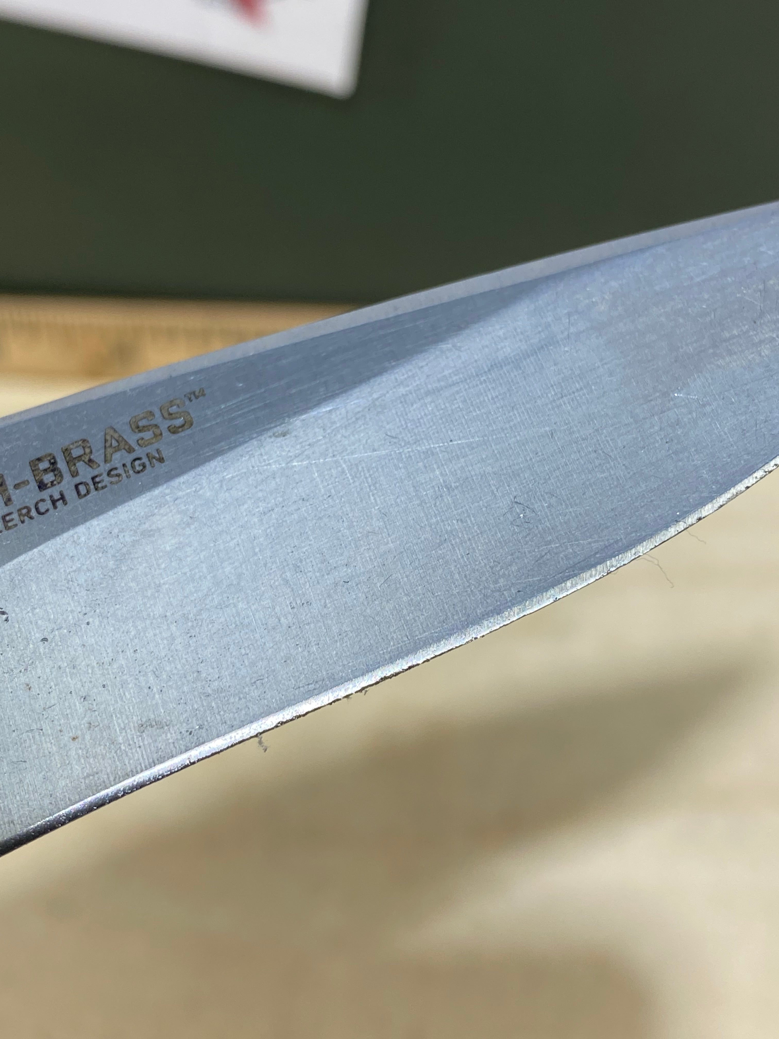 CRKT R2601 High-Brass #-91. Light usage. Chips on blade. Discontinued.