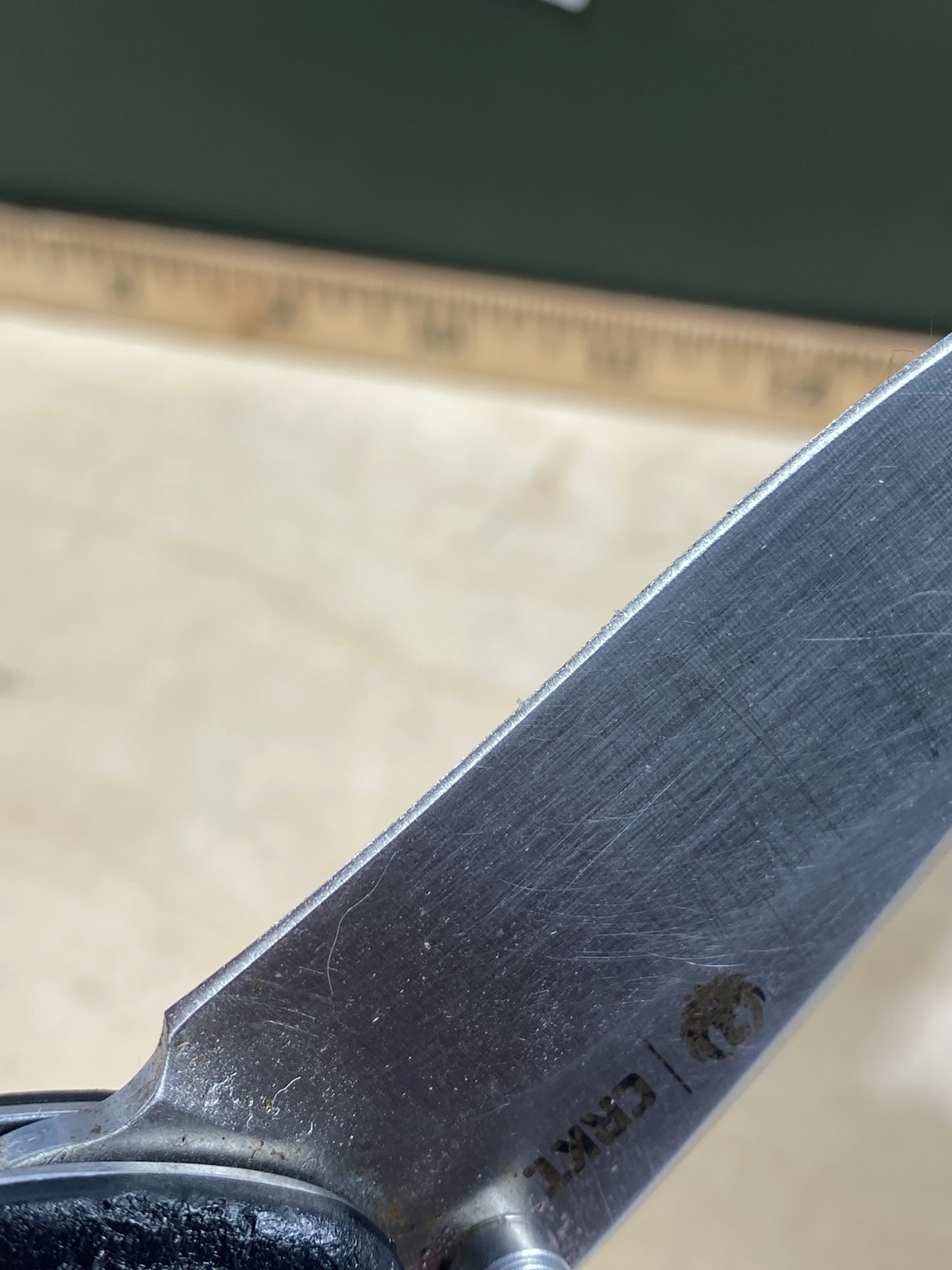 CRKT R2601 High-Brass #-91. Light usage. Chips on blade. Discontinued.