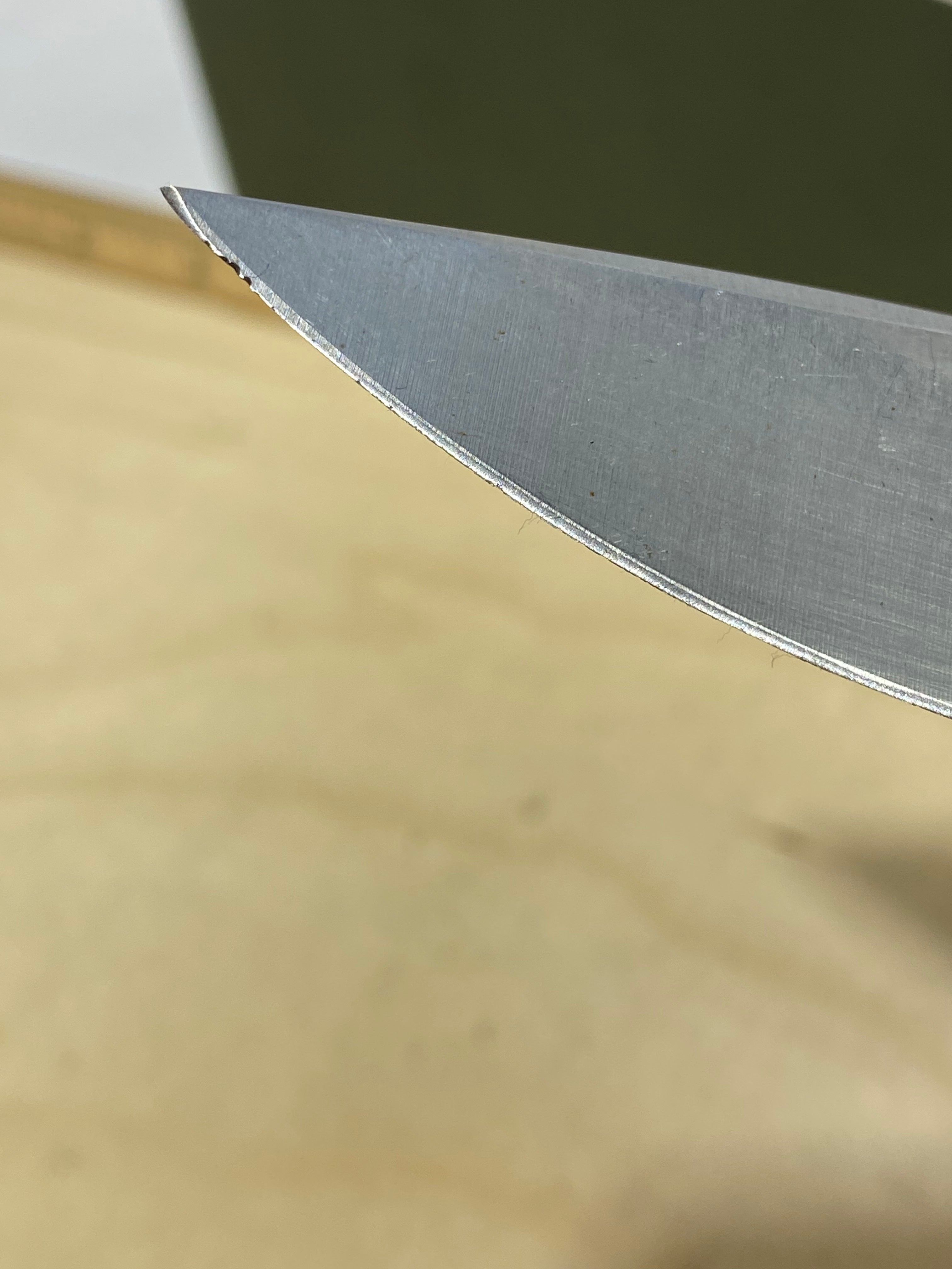 CRKT R2601 High-Brass #-91. Light usage. Chips on blade. Discontinued.