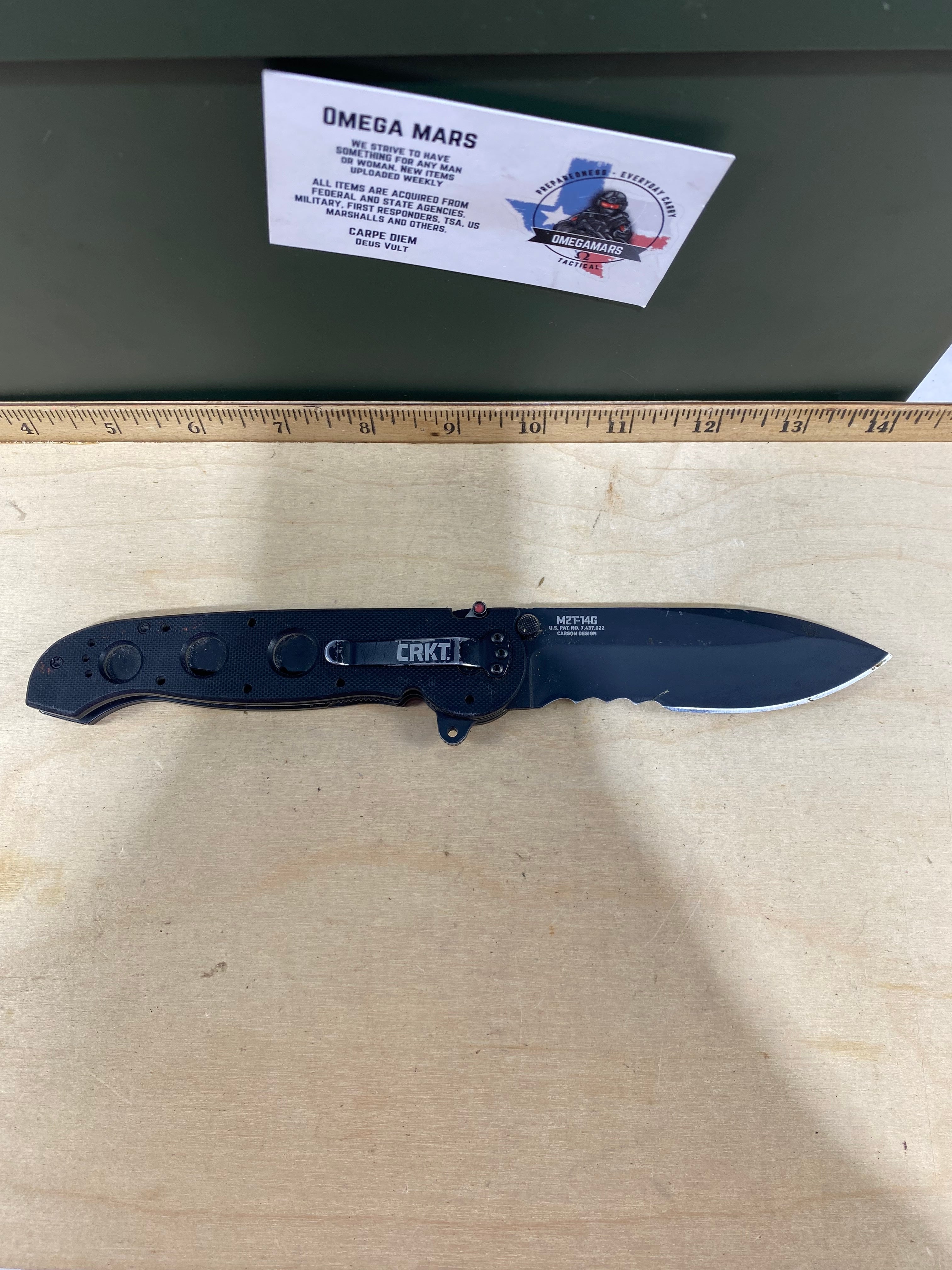 CRKT M21-14G Big Dog #-110. Light usage. Dirty.