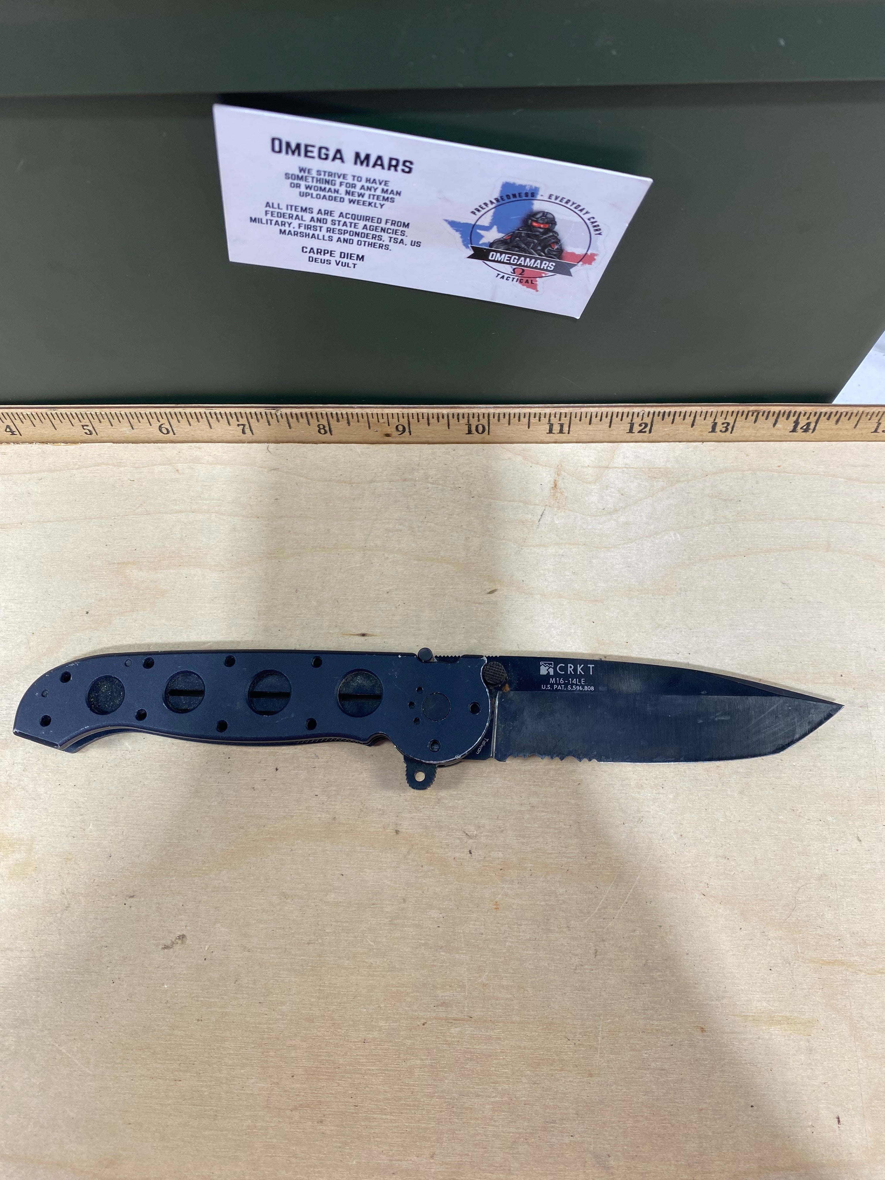CRKT M16-14LE #-112. Light usage. Chip on blade.