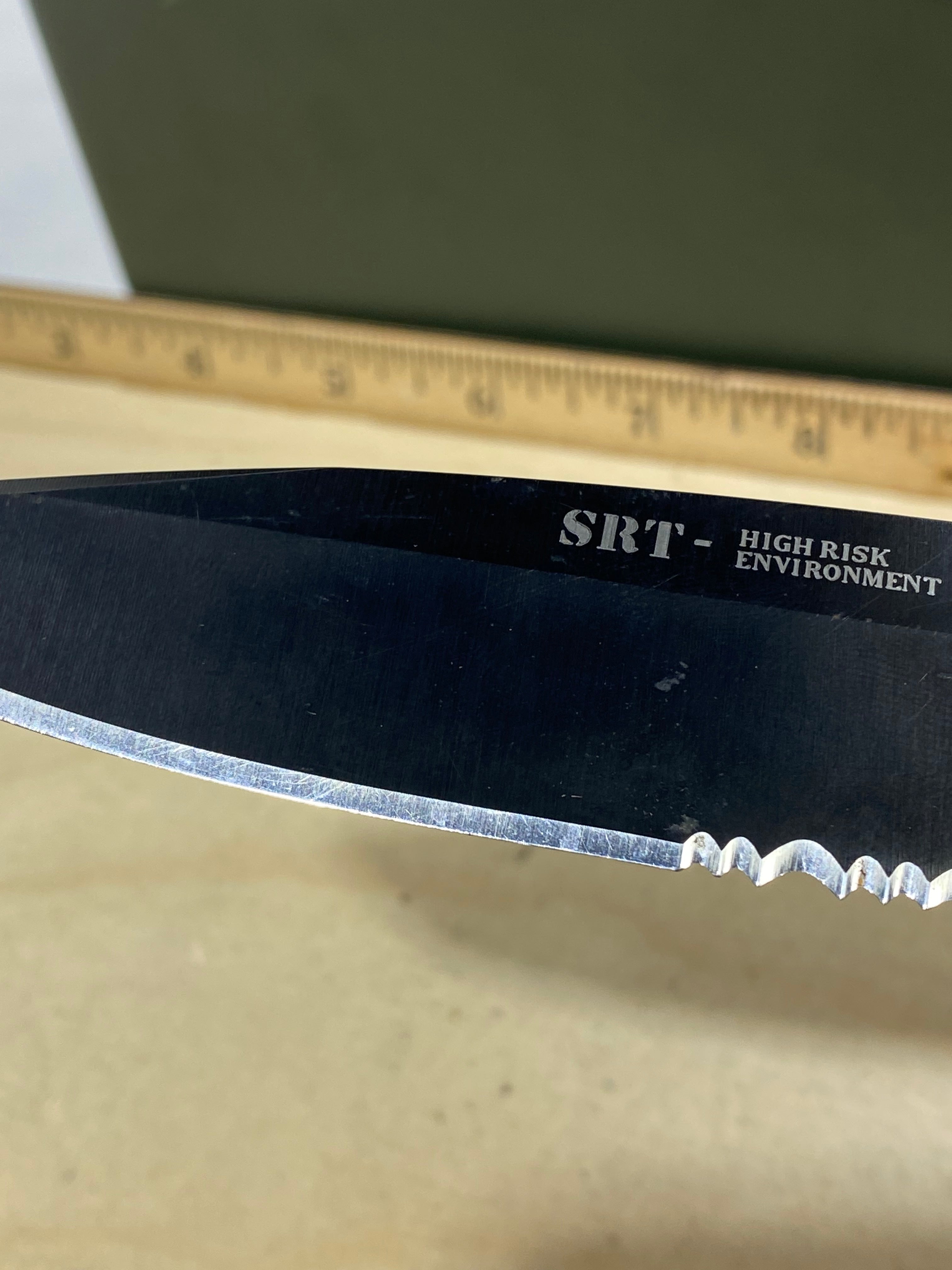 CRKT M16-14LE #-112. Light usage. Chip on blade.