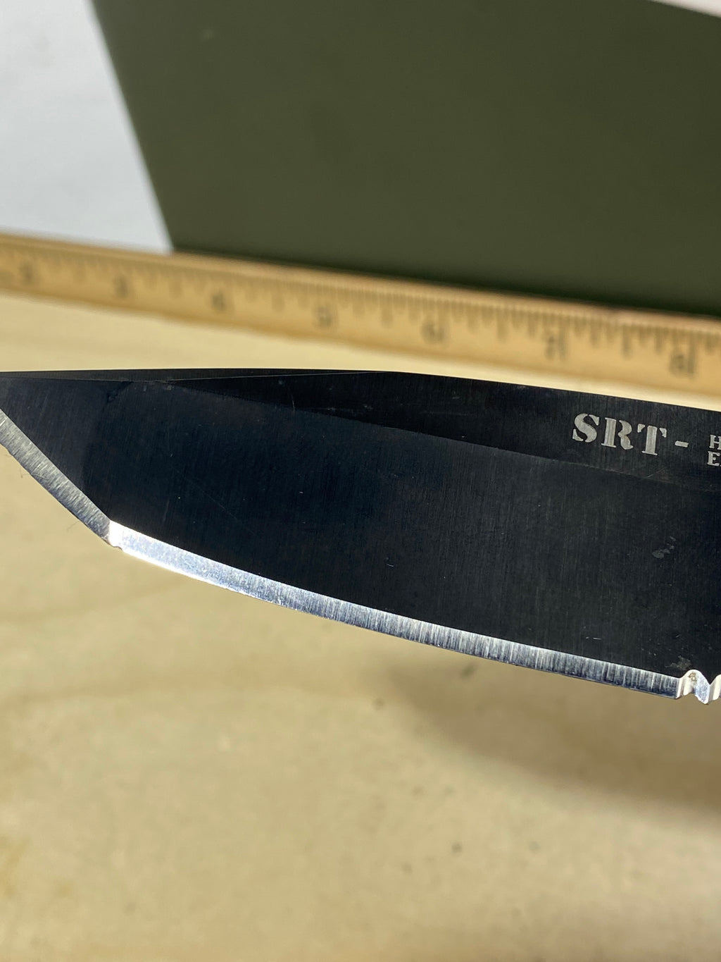 CRKT M16-14LE #-112. Light usage. Chip on blade.