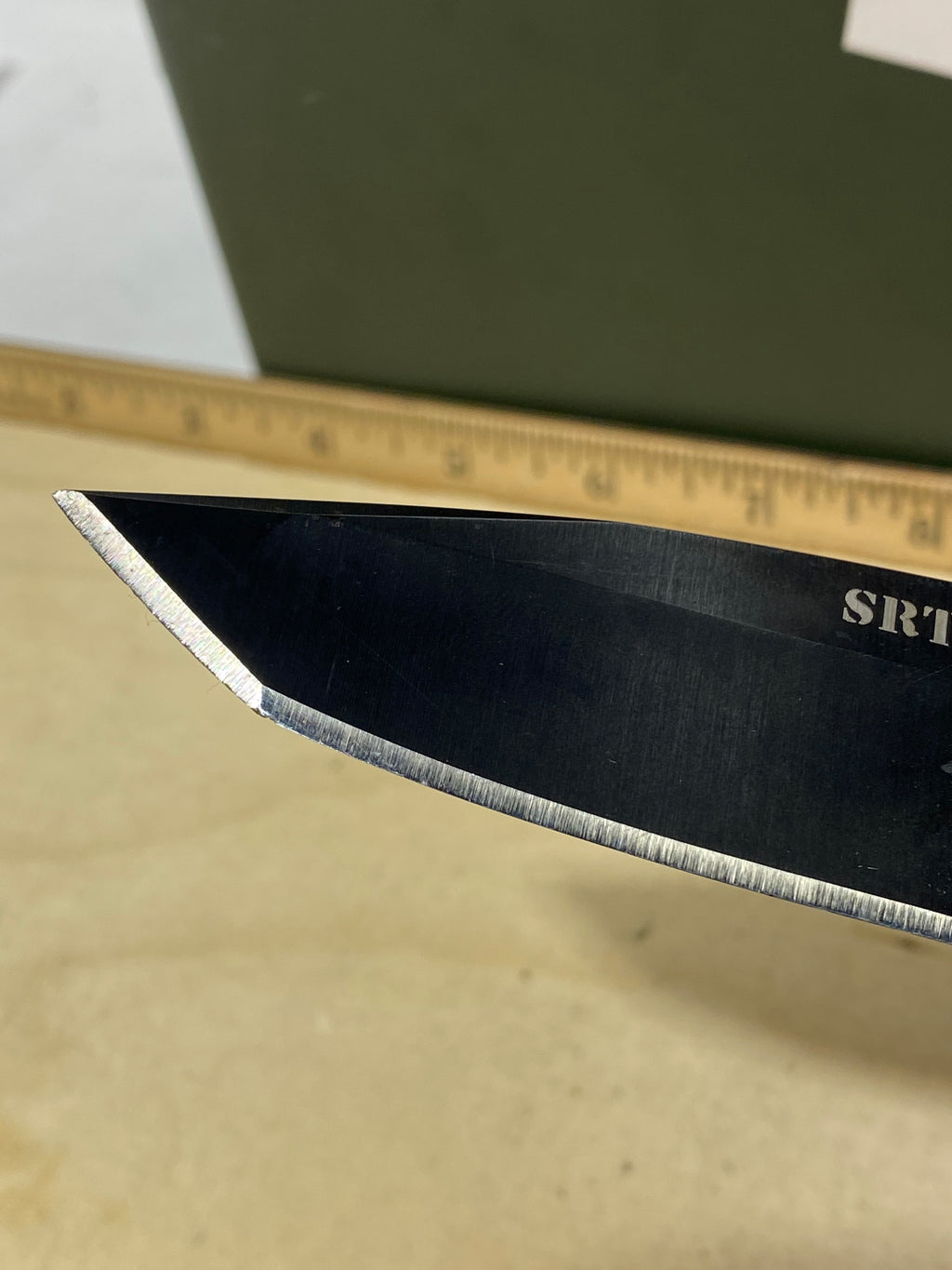 CRKT M16-14LE #-112. Light usage. Chip on blade.