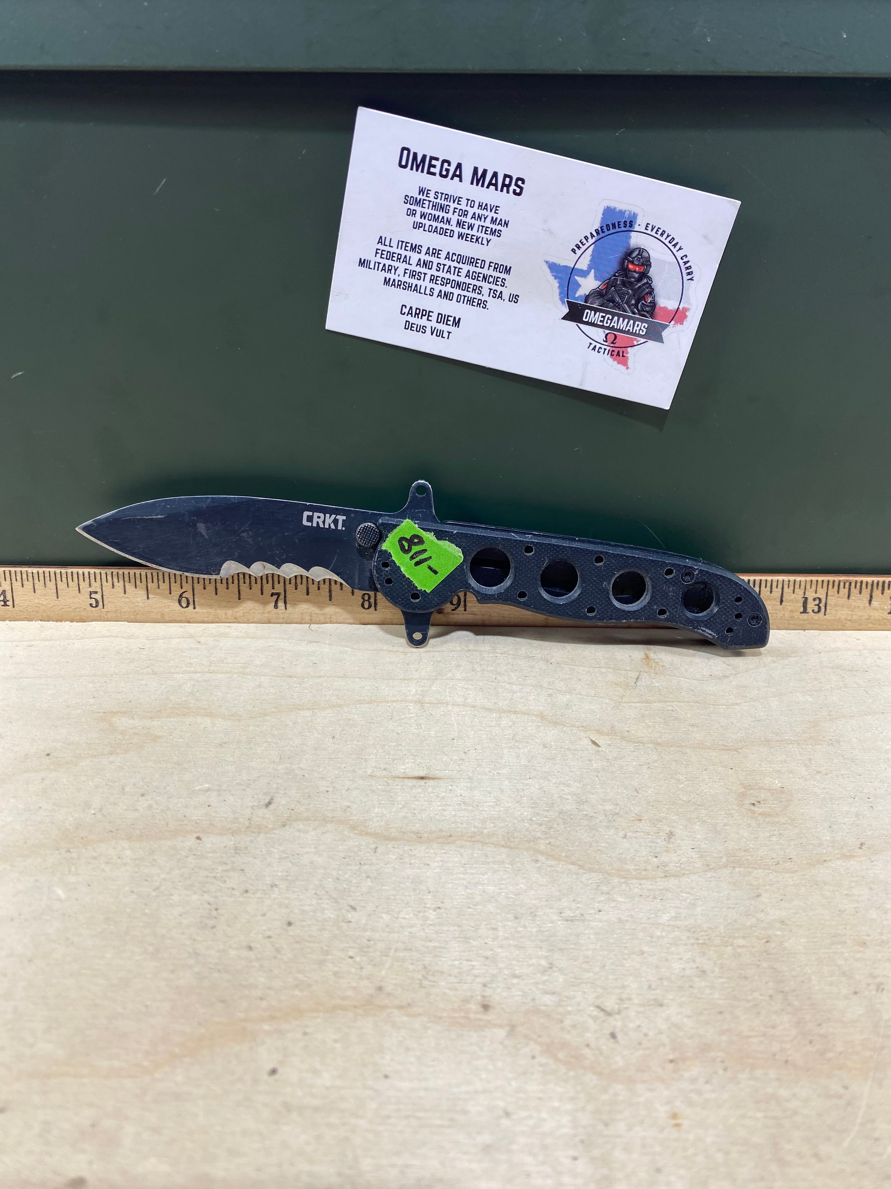 CRKT M21-12SFG #-118. Light usage. Dirty. Chip on blade.
