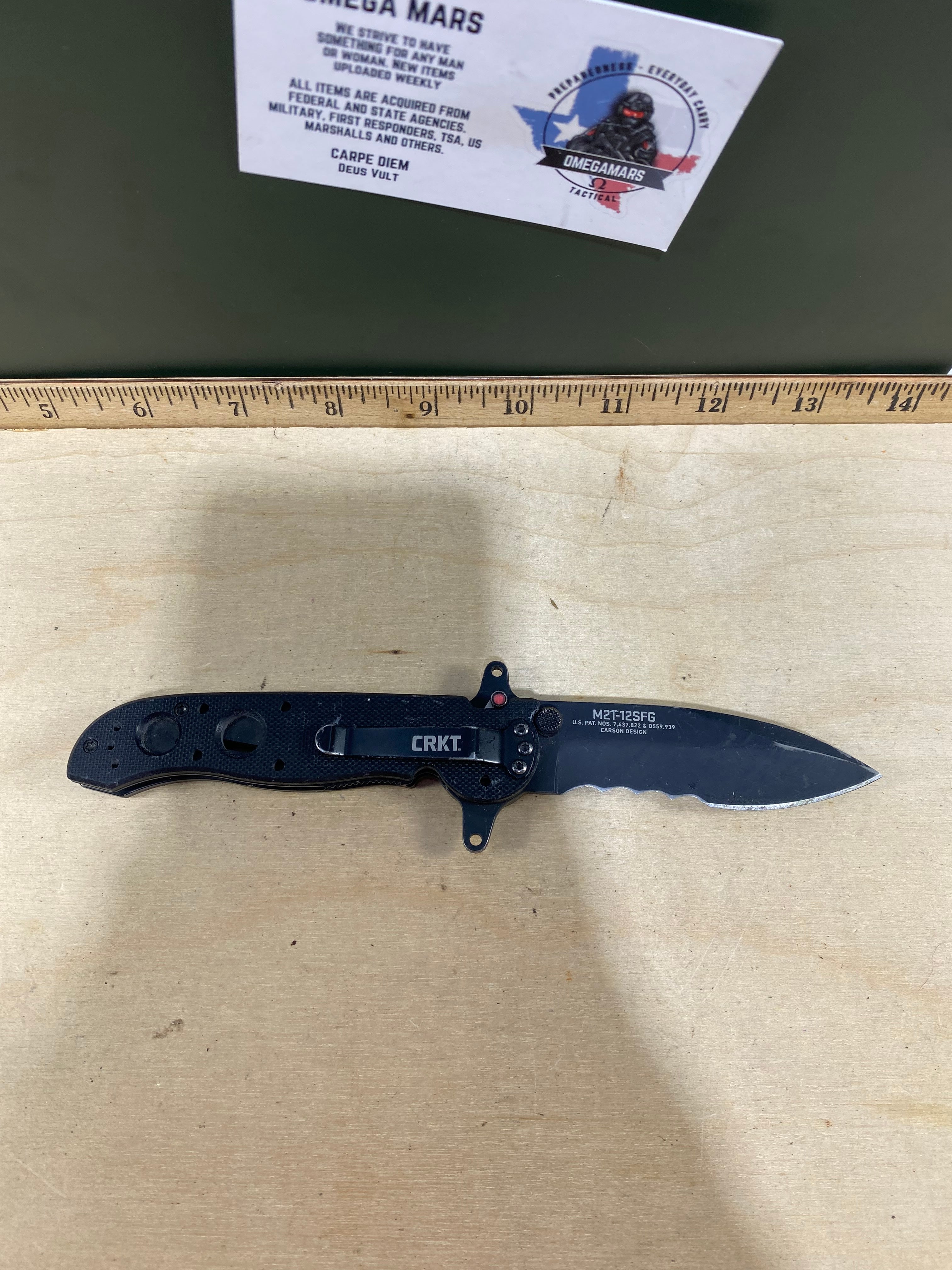 CRKT M21-12SFG #-118. Light usage. Dirty. Chip on blade.