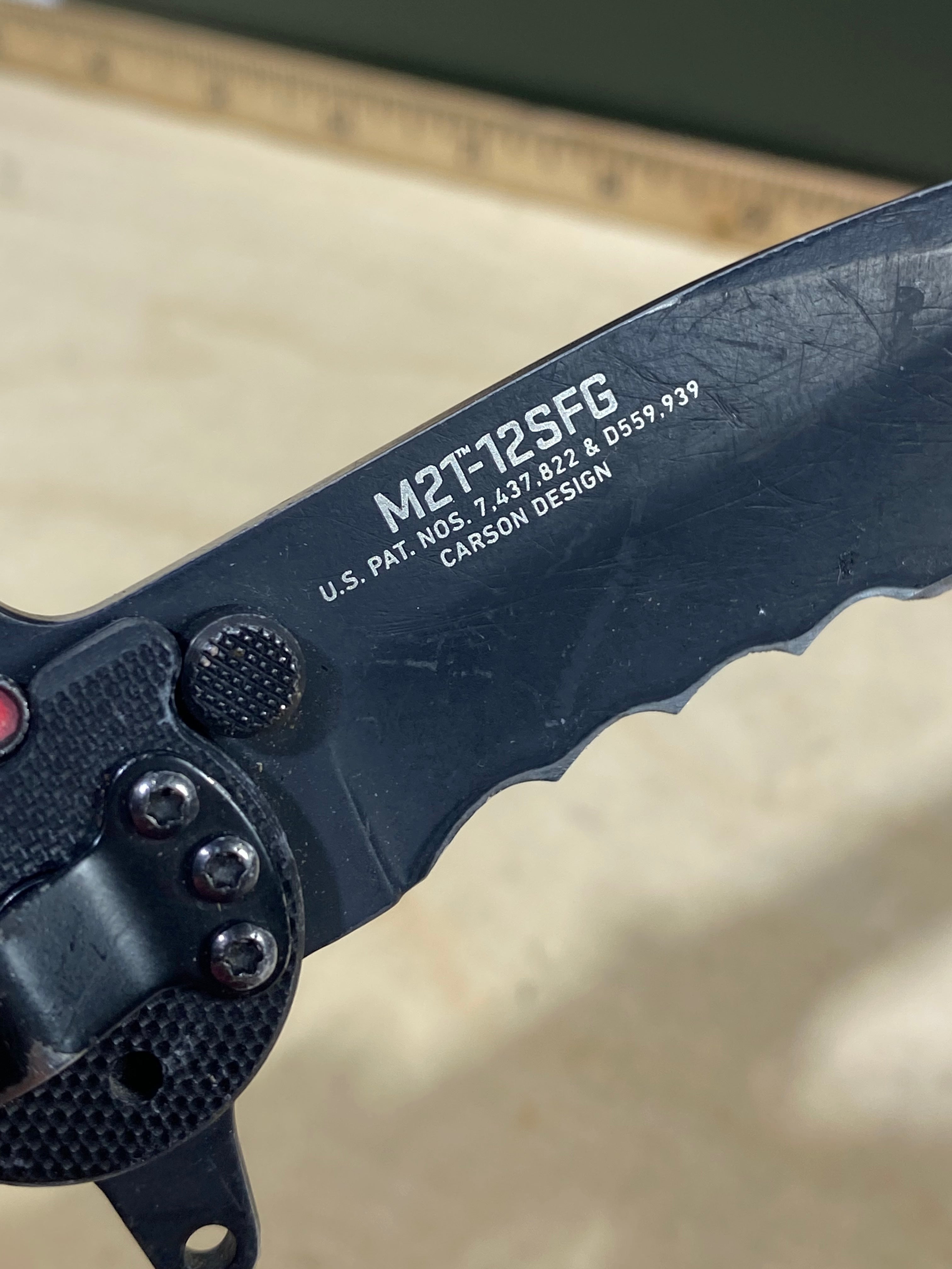 CRKT M21-12SFG #-118. Light usage. Dirty. Chip on blade.