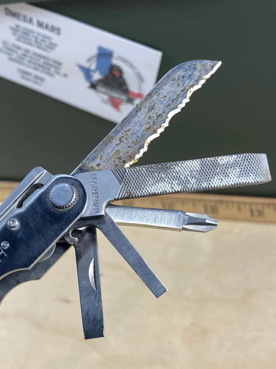 Leatherman Crunch with leather sheath LCH#1. Light usage, dirty. Discontinued