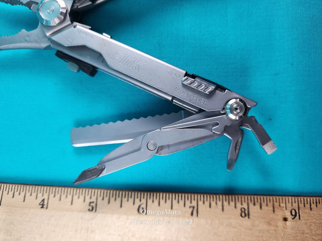 GERBER Rare Discontinued Gerber Multi Plier Flik Fisherman Multitool Great condition