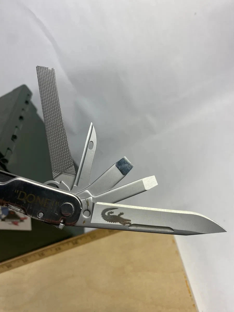 Leatherman Super Tool 300 LST#5. Looks/feel brand new. Handle customized, dirty