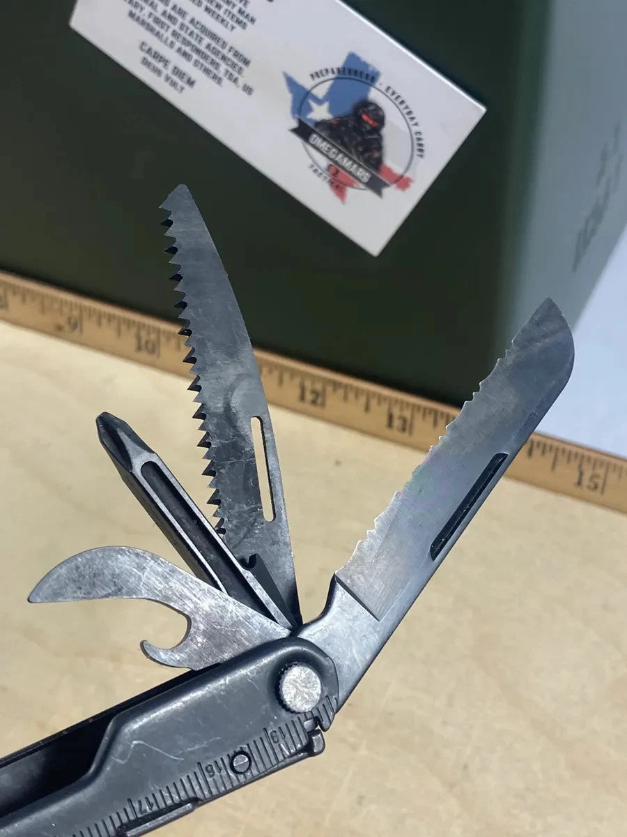 Leatherman Rebar #R11. 1-2 tools (saw/knife show usage, rest looks/feel brand new