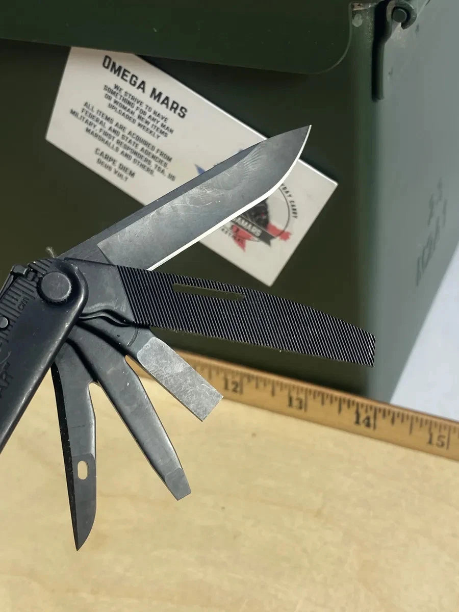 Leatherman Rebar #R11. 1-2 tools (saw/knife show usage, rest looks/feel brand new