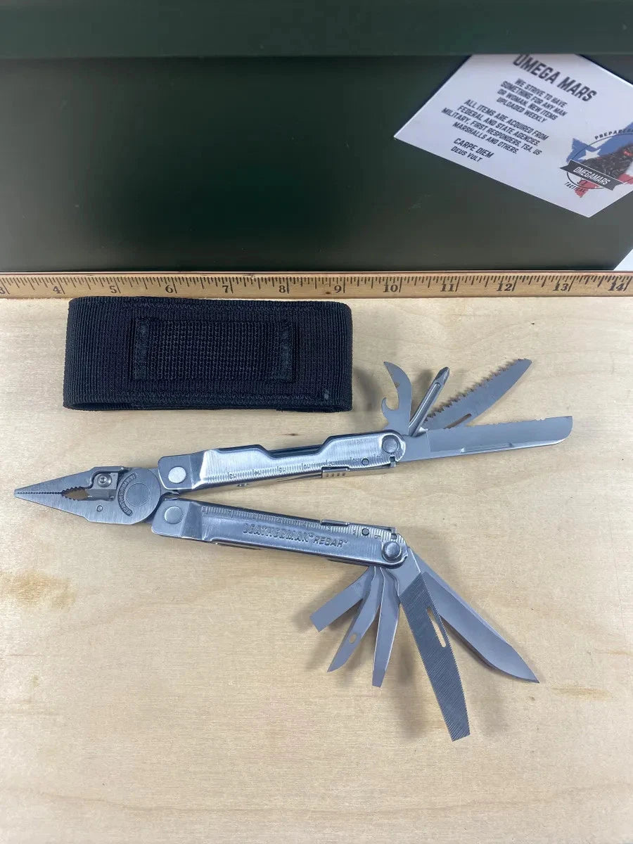 Leatherman Rebar #R2. Saw & bottle opener used/dirty, the rest looks/feels new