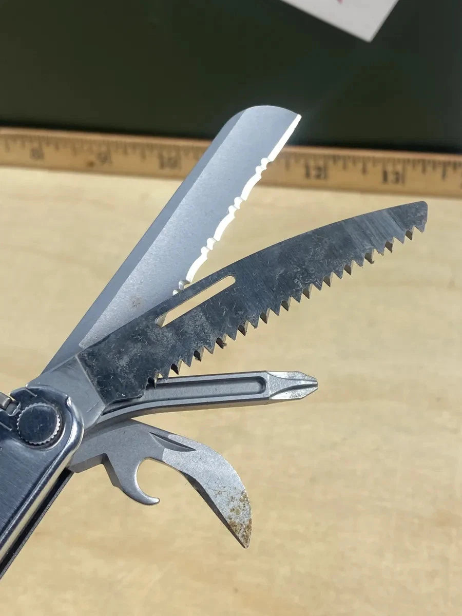 Leatherman Rebar #R2. Saw & bottle opener used/dirty, the rest looks/feels new